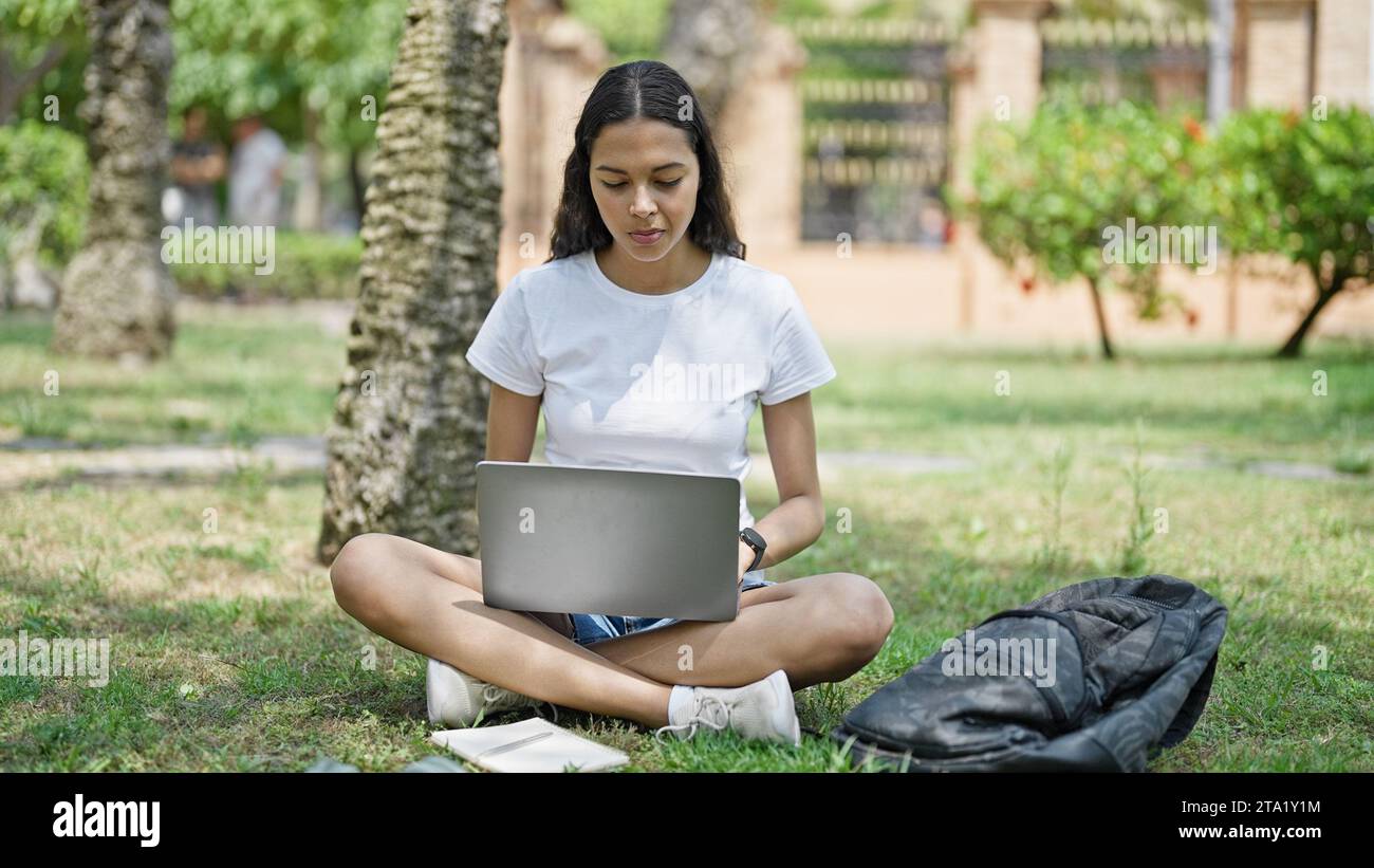 African american woman student using laptop studying at university ...