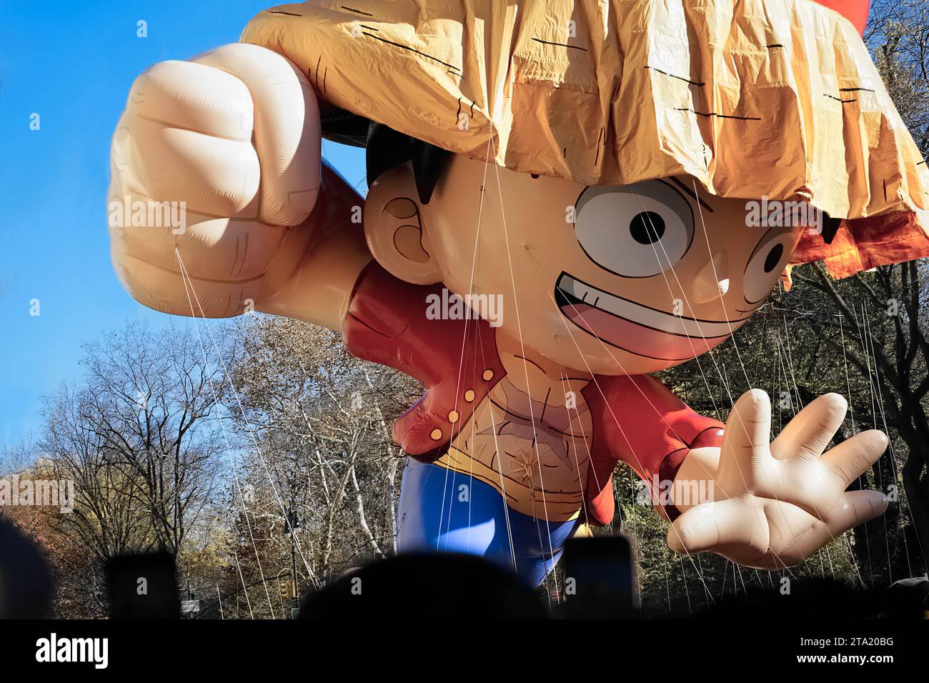New York, NY - November 23, 2023: Macy's Thanksgiving Day Parade balloon of world famous Japanese manga anime character, Mugiwara no Monkey D. Luffy Stock Photo