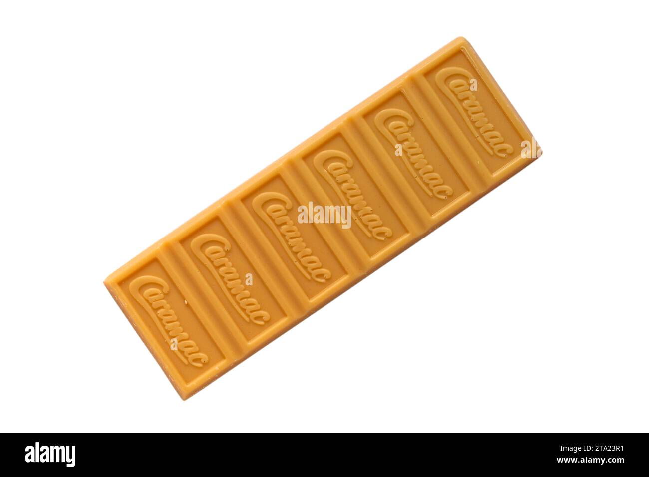 bar of Nestle Caramac chocolate unwrapped to show contents isolated on white background - looking down on from above - The Caramel Flavour bar Stock Photo