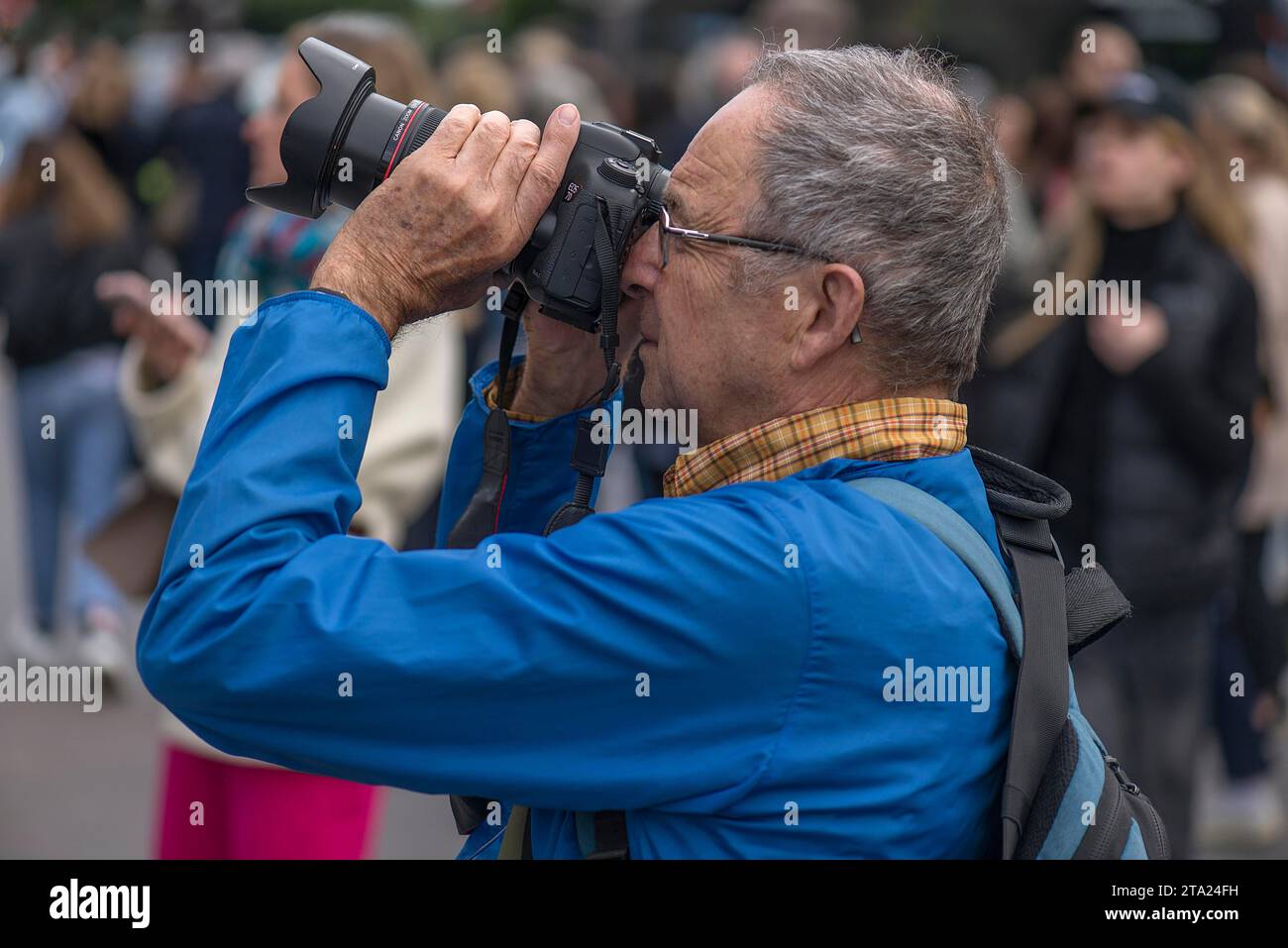 Elderly gentleman taking pictures, Paris, France Stock Photo