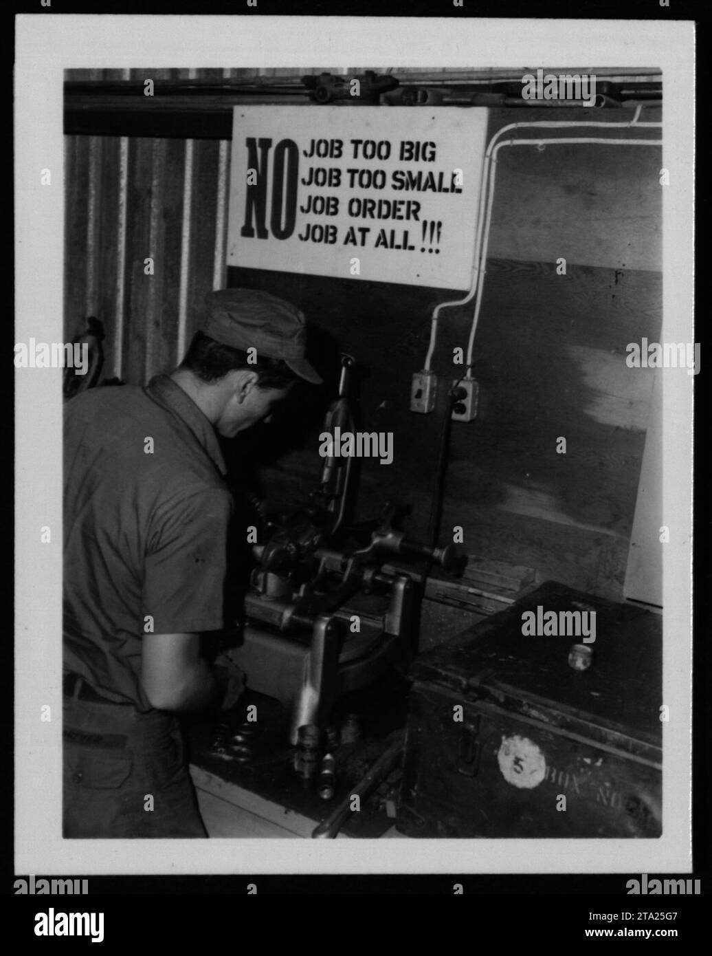 American military personnel perform maintenance tasks on vehicles ...