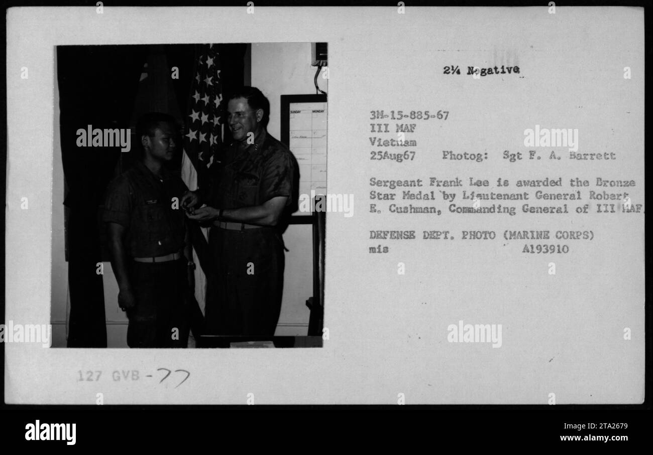 Sergeant Frank Lee receives the Bronze Star Medal from Lieutenant