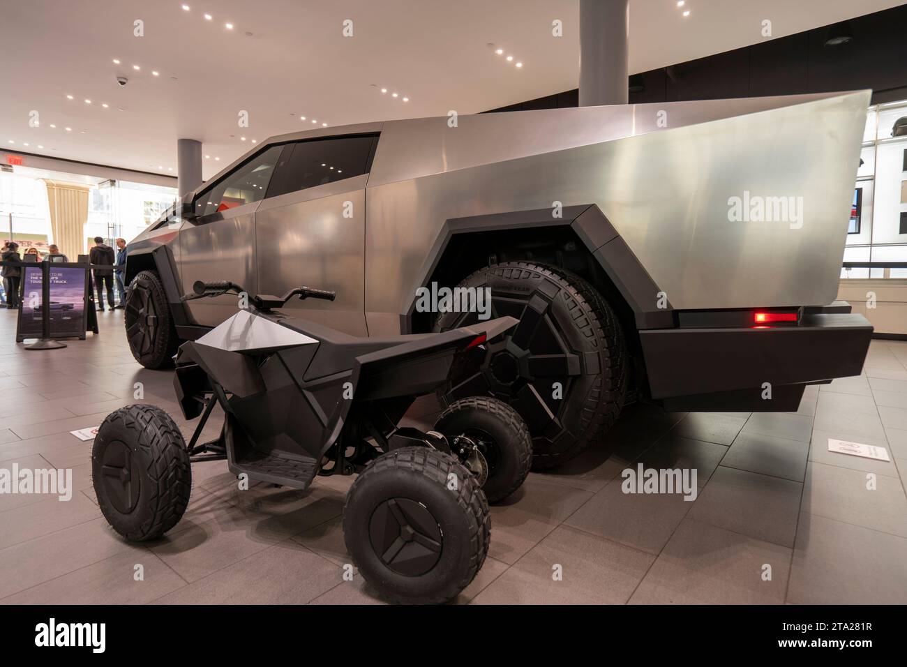 Tesla Cybertruck is displayed together with the Cyberquad for kids at the Tesla showroom in San Jose's Santana Row on Friday, November 24, 2023. Stock Photo