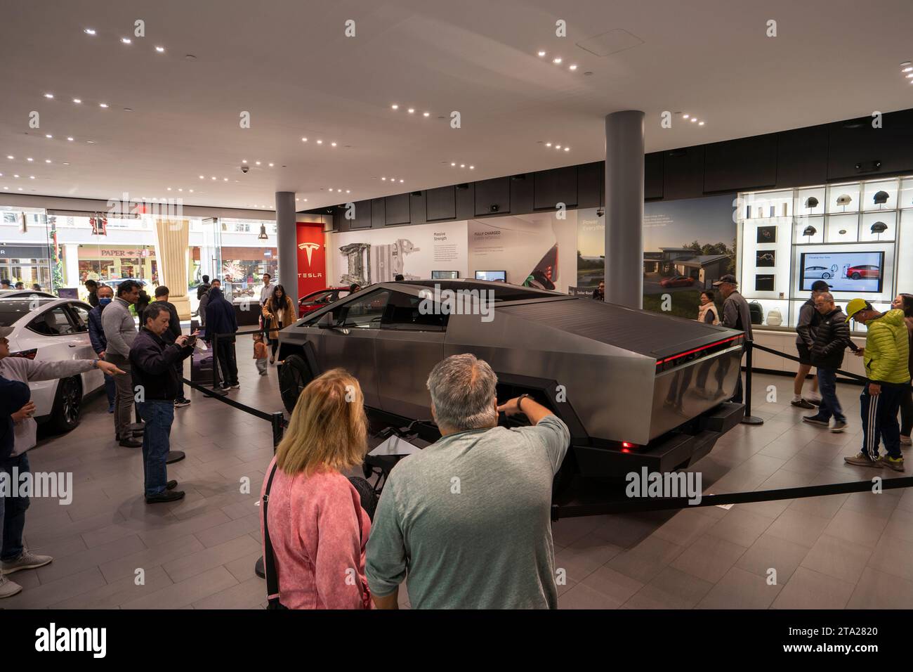 Tesla fans visit the Tesla showroom in San Jose's Santana Row in California to catch a peek of the new Cybertruck on Friday, November 24, 2023. Stock Photo