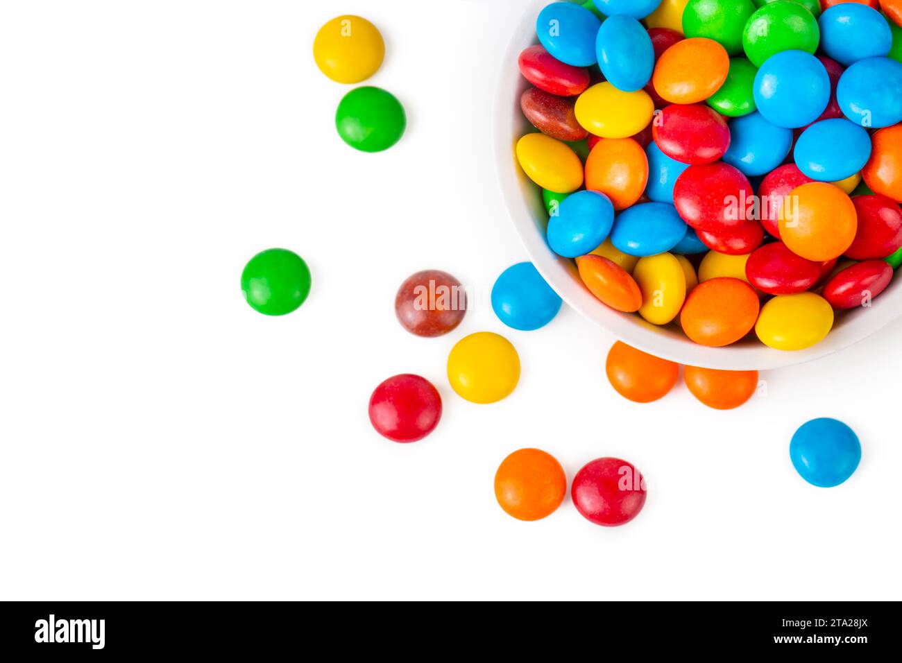 Colorful chocolate buttons on a white background Stock Photo