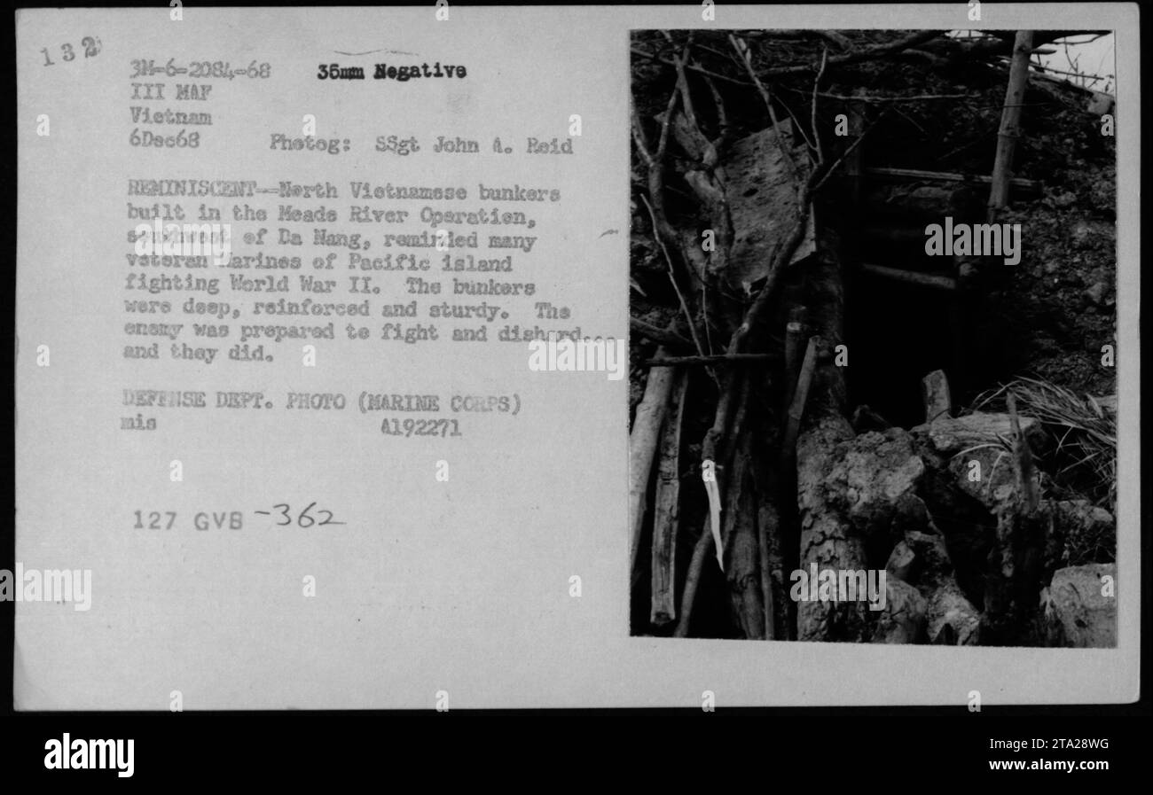 Soldiers exploring Viet Cong tunnels and caves during the Vietnam War. These bunkers, discovered during the Meade River Operation near Da Nang, were reminiscent of the Pacific island fighting in World War II. The enemy had created deep, reinforced structures, showing their preparedness for battle. Marine Corps troops encountered fierce resistance but persisted in their mission. Photograph taken on December 6, 1968, by SSgt John A. Reid. Defense Department Photo, mis 4192271. Stock Photo