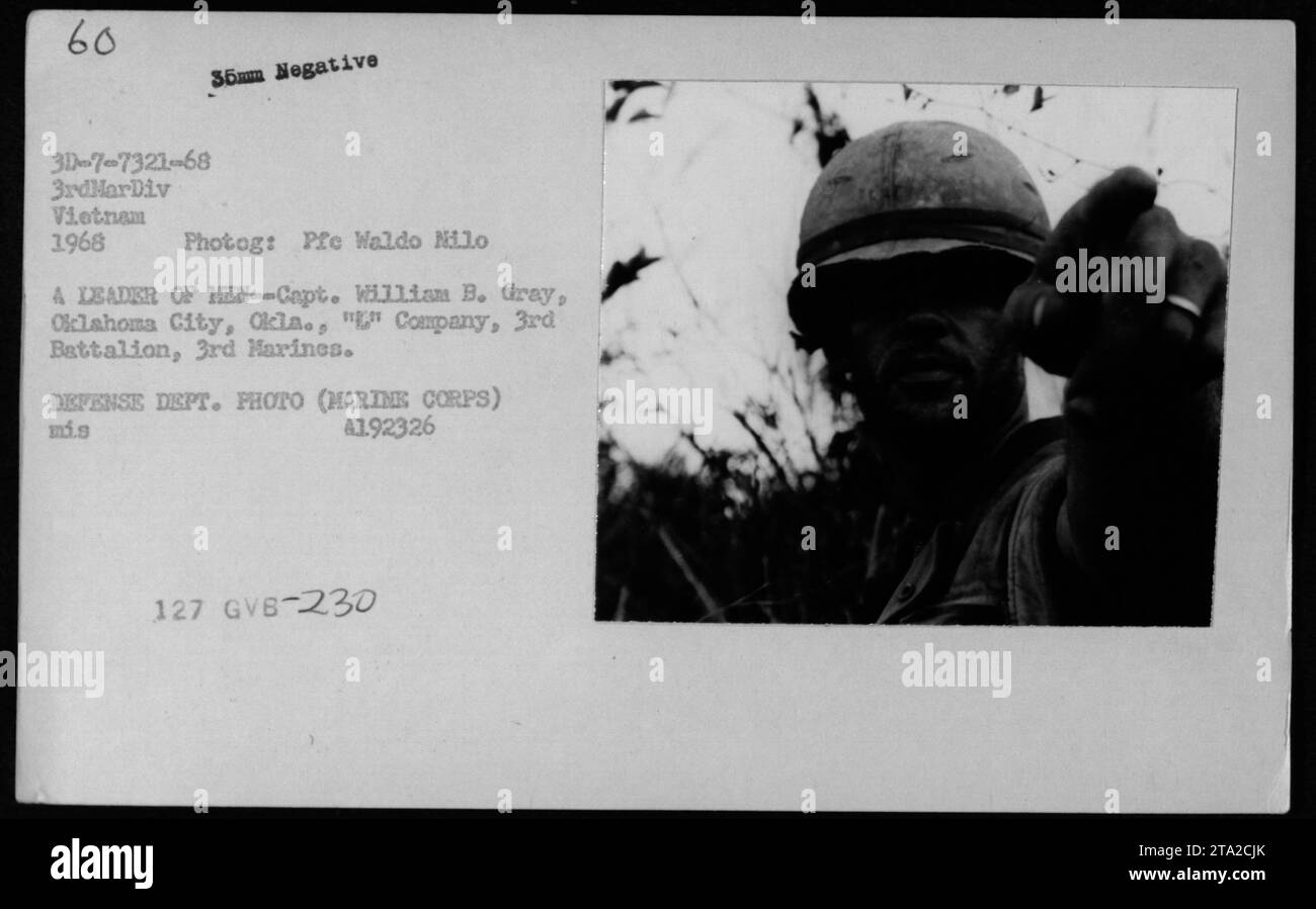 Captain William B. Gray, from Oklahoma City, Oklahoma, is seen in this photograph as a leader of 'E' Company, 3rd Battalion, 3rd Marines in Vietnam in 1968. The image was taken by Photographer Pre Waldo Nilo. It is an official Defense Department photo, attributing to the United States Marine Corps during the Vietnam War. Stock Photo
