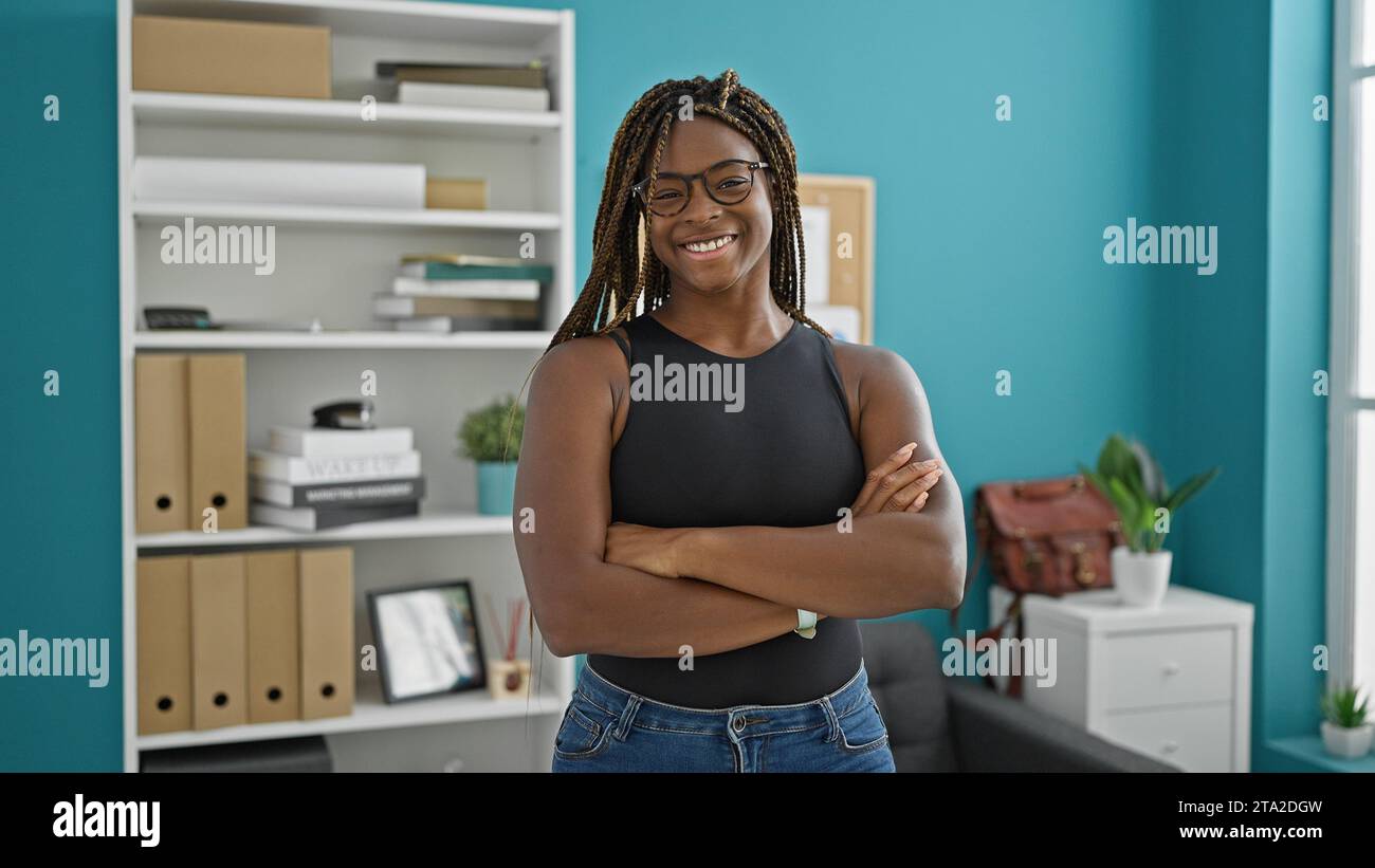 African american woman business worker smiling confident standing with ...