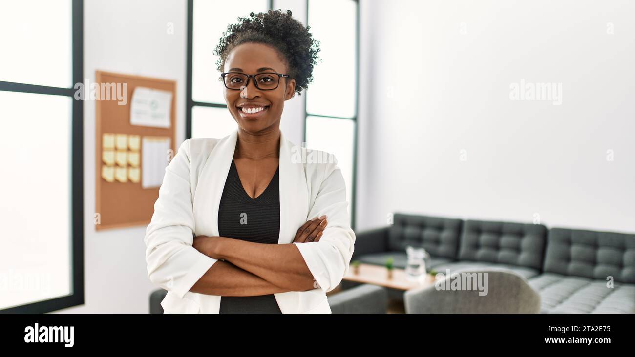 African american woman business worker smiling confident standing with ...