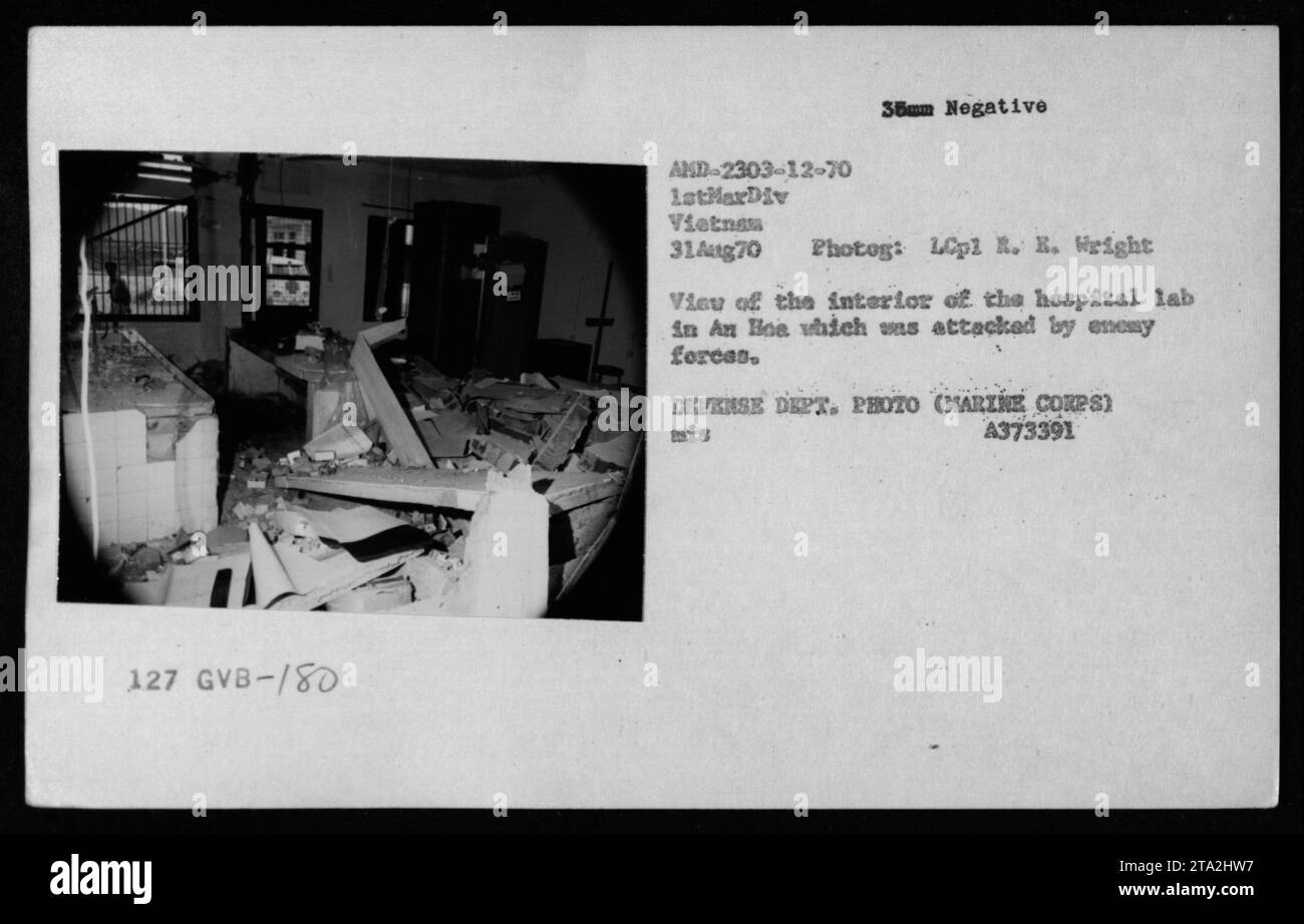 Interior view of the hospital lab in An Hoe, Vietnam, taken on August 31, 1970. The lab was damaged during an enemy attack. The image shows the extent of the damage inflicted by enemy forces. This photograph was captured by LCpl R. R. Wright and is part of the Photographs of American Military Activities during the Vietnam War collection (AND-2303-12-70 1stMarDiv Vietnam 31Ag70). This picture is classified under Defense Department Photograph (Marine Corps) mis A373391. Stock Photo