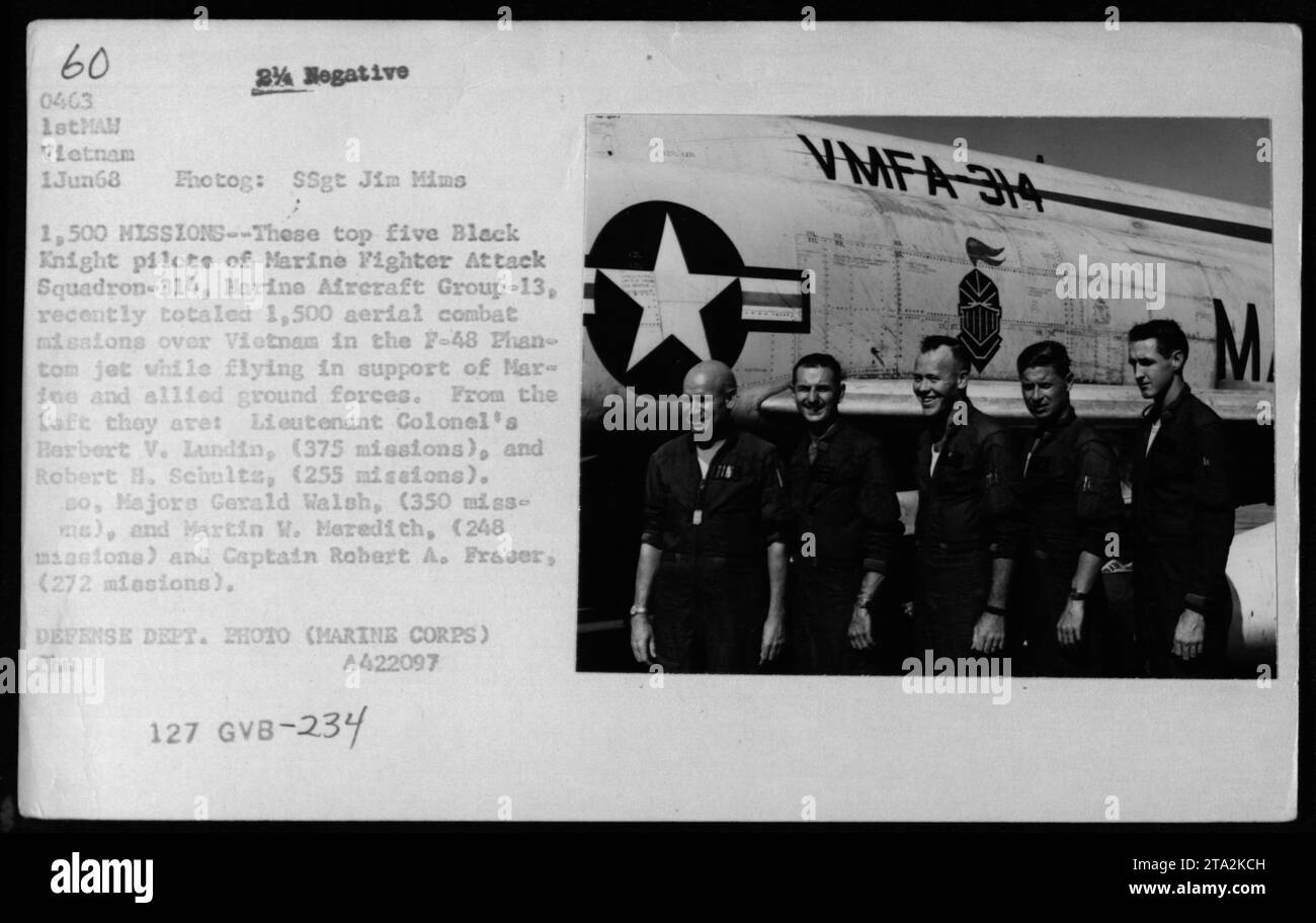 Marine Fighter Attack Squadron-314 pilots and crewmen, including Lieutenant Colonel Herbert V. Lundin, Lieutenant Colonel Robert H. Schultz, Majors Gerald Walsh and Martin W. Meredith, and Captain Robert A. Fraser, pose for a photo. Together, they have recently completed a total of 1,500 aerial combat missions over Vietnam in F-48 Phantom jet planes while providing air support to Marine and allied ground forces. Stock Photo