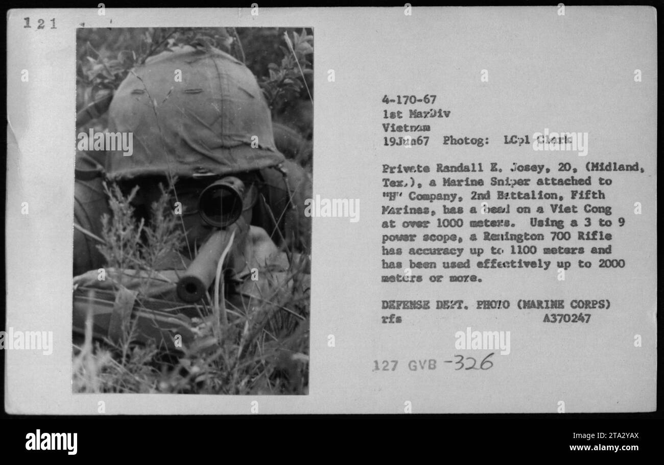 Marine Sniper Pvt. Randall E. Josey, 20, from Midland, Texas, stationed in Vietnam, aims his Remington 700 Rifle at least 1000 meters away at a potential Viet Cong target. Equipped with a 3 to 9 power scope, the rifle boasts accuracy up to 1100 meters and has even been used effectively beyond 2000 meters. This photograph was taken on June 19, 1967, by LCpl Clark. Defense Department Photo (Marine Corps). Stock Photo