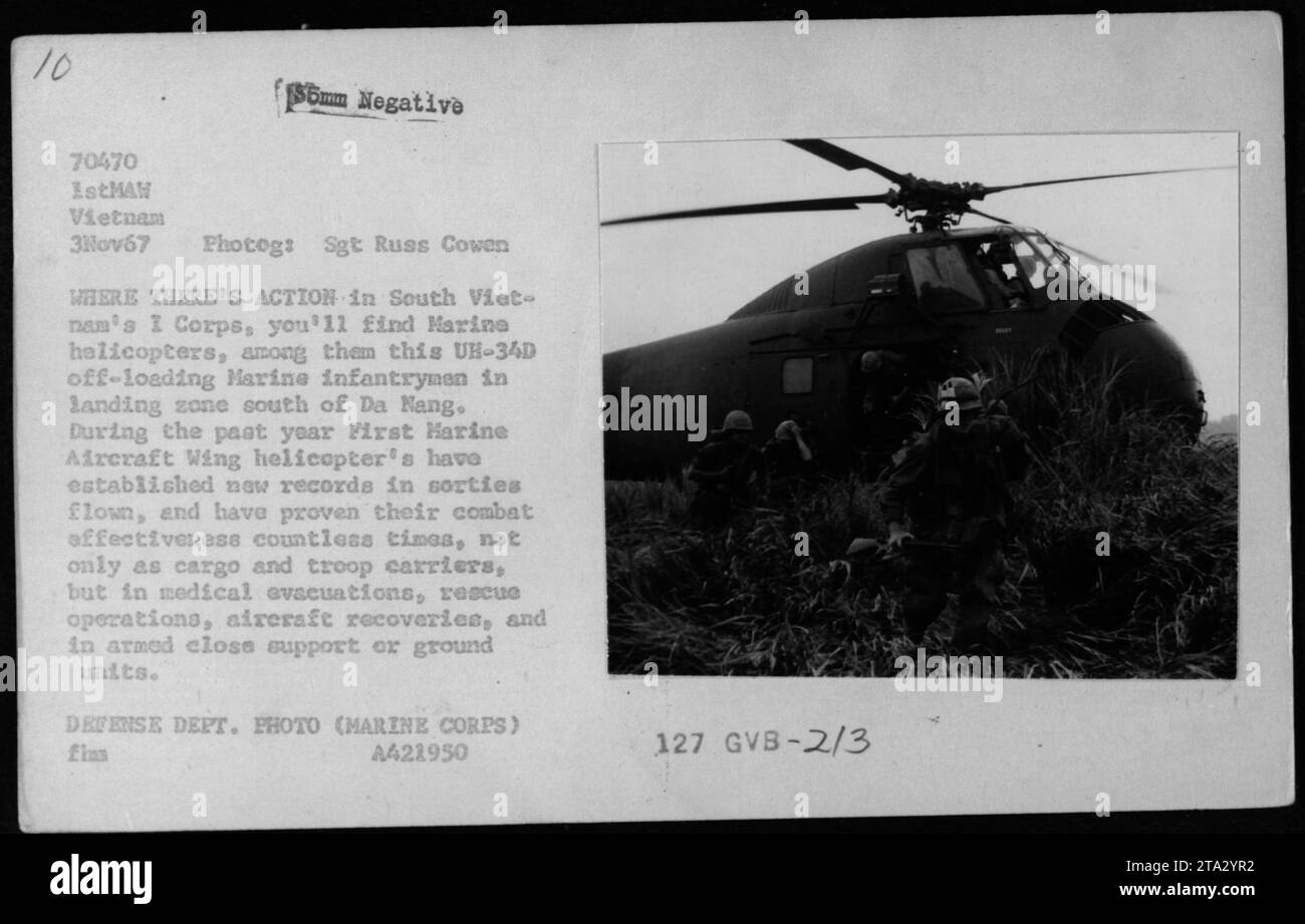 UH-34D Marine Corps helicopter off-loading infantrymen in a landing zone south of Da Nang, Vietnam on November 3, 1967. Marine helicopters played a vital role in various military activities in South Vietnam's I Corps, including cargo and troop transportation, medical evacuations, rescue operations, aircraft recoveries, and armed close support for ground units. Photo by Sgt. Russ Cowen, Defense Department (Marine Corps) A421950. Stock Photo