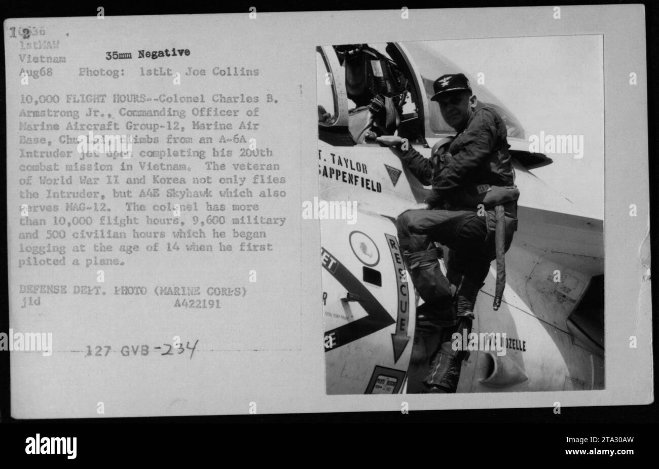 Colonel Charles B. Armstrong Jr., Commanding Officer of Marine Aircraft Group-12, Marine Air Base, Chu Lai, is seen climbing out of his A-6A Intruder jet after completing his 200th combat mission in Vietnam. He is a veteran of World War II and Korea, with over 10,000 flight hours, both military and civilian. Photo taken in August 1968. Stock Photo
