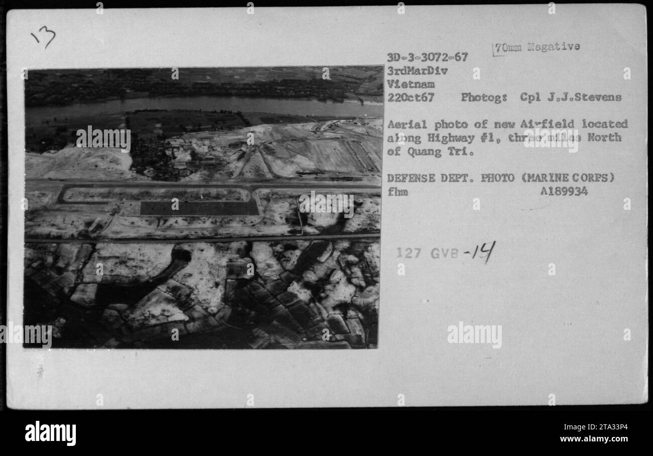 Aerial photograph taken on October 22, 1967, by Cpl J.J. Stevens during the Vietnam War. It shows a new airfield located along Highway #1, three miles North of Quang Tri. The photograph is part of the Defense Department's collection and is labeled fhm A189934 127 GVB-14. Stock Photo