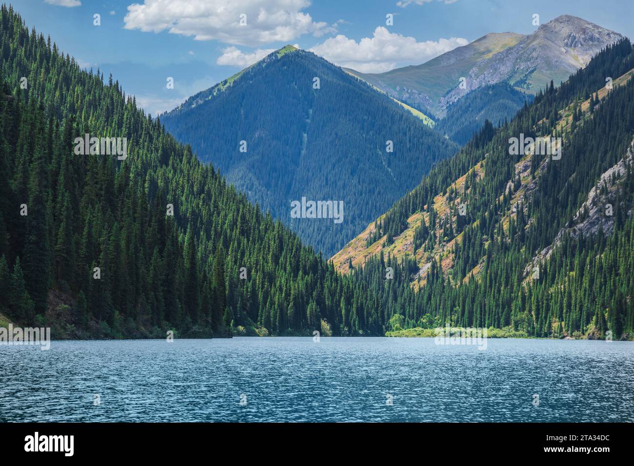 Amazing blue water in Kolsay lake in Kolsai Koldery gorge near Almaty, nature of Kazakhstan National Park, Central Asia Stock Photo