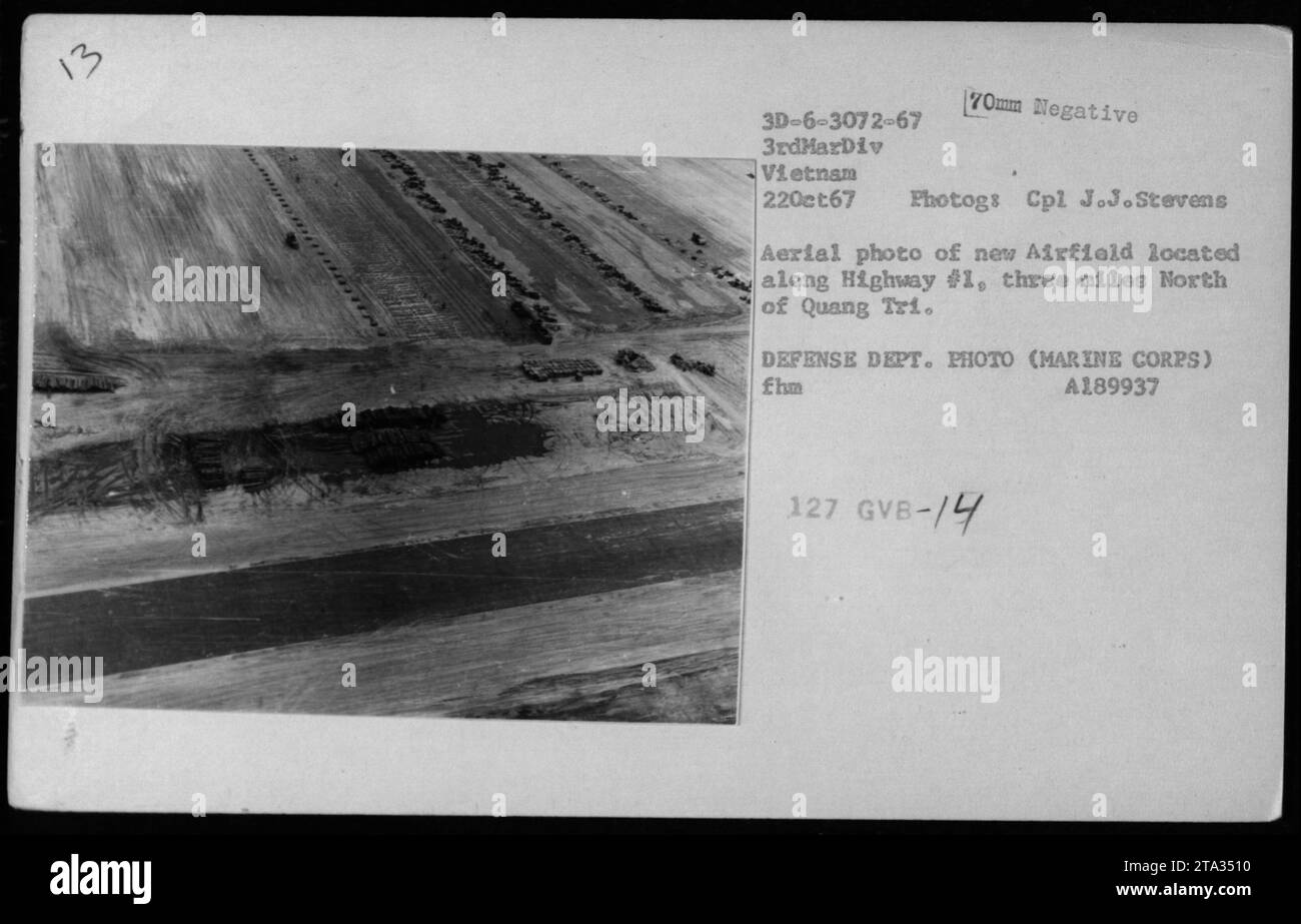 Aerial photo of a new airfield located along Highway #1, three miles north of Quang Tri. The photo was taken on October 22, 1967 by Marine Corps Corporal J.J. Stevens. It is a 70mm negative captured during the Vietnam War. The photo was part of the Defense Department's collection. Stock Photo