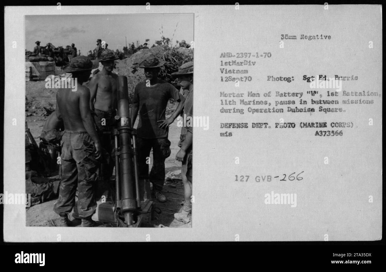 Marine Corps Mortar Men from Battery 'W', 1st Battalion, 11th Marines take a brief break during Operation Duboise Square on September 12, 1970 in Vietnam. The men are seen pausing in between missions, ready to carry out their duties. Image is Defense Department photo #A373566. Stock Photo