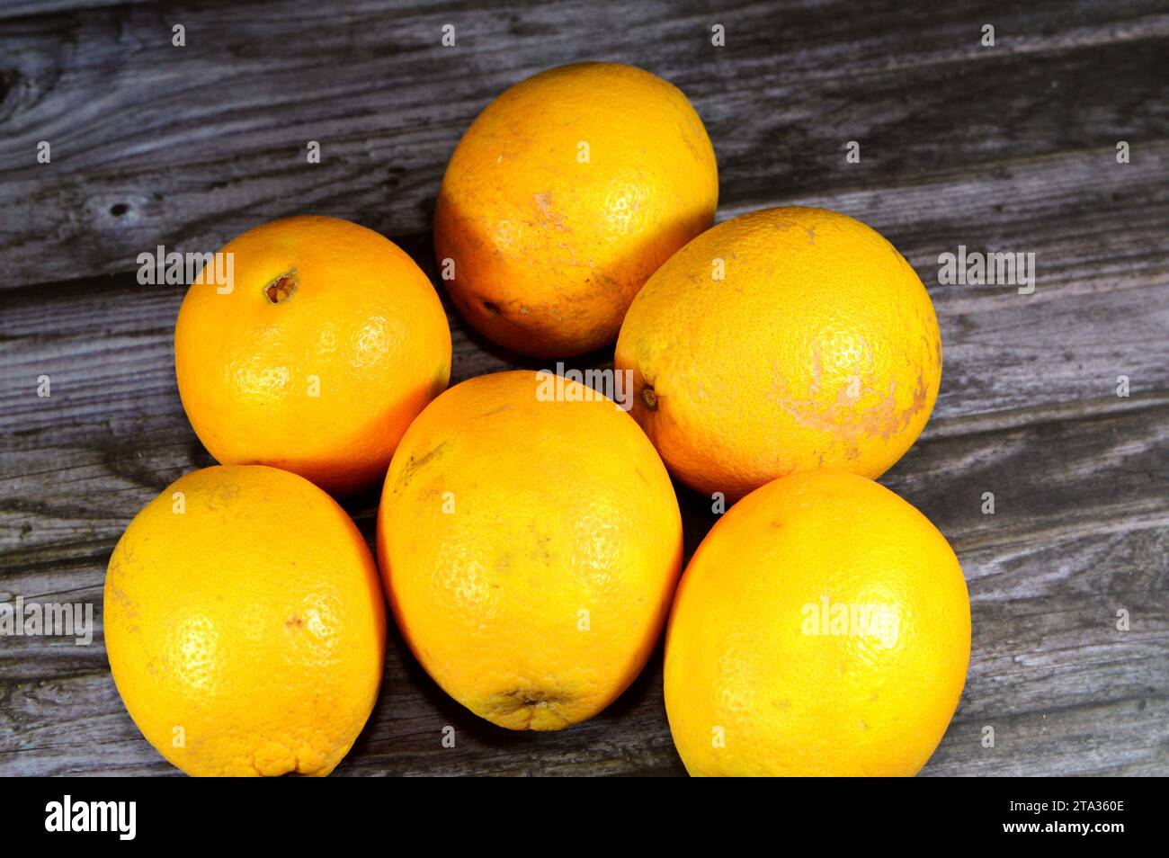 navel orange fruit, An orange is a fruit of various citrus species in the family Rutaceae, a hybrid between pomelo (Citrus maxima) and mandarin (Citru Stock Photo