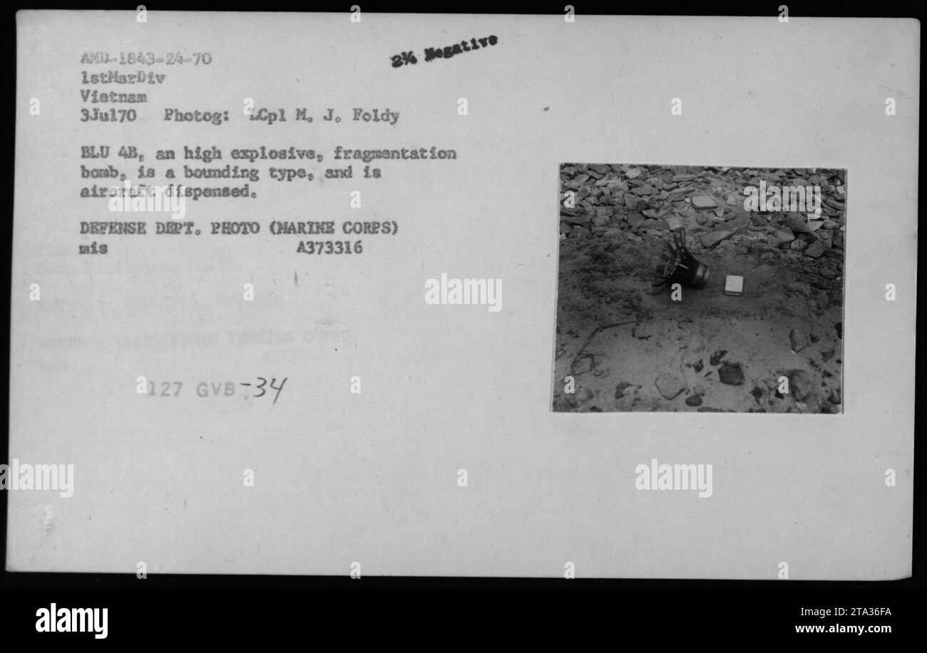On July 3, 1970, LCpl M.J. Foldy photographed a BLU 48 high explosive fragmentation bomb being loaded onto a military aircraft in Vietnam. The bomb was aircraft-dispensed. The image is part of Defense Department archives. Stock Photo