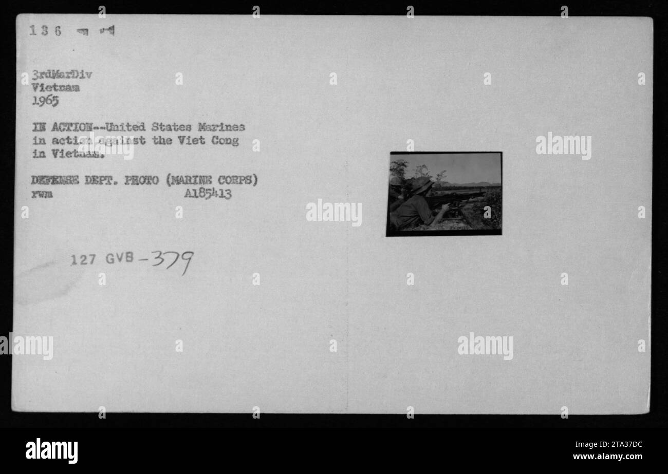 US Marines engage Viet Cong forces during the Vietnam War in 1965. The photograph depicts Marines using American weapons in combat in Vietnam. This image is a documentation of the military activities of the 3rd Marine Division. It was taken by the US Defense Department and is labeled as A1854-13 XWB 127 GVB-379. Stock Photo