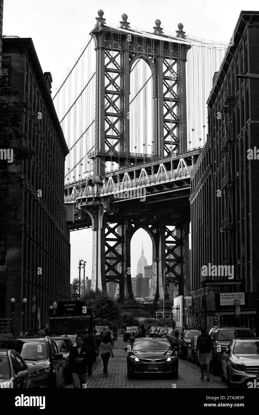 New York, USA - June 9, 2018: People near the Manhattan Bridge in Brooklyn. Stock Photo