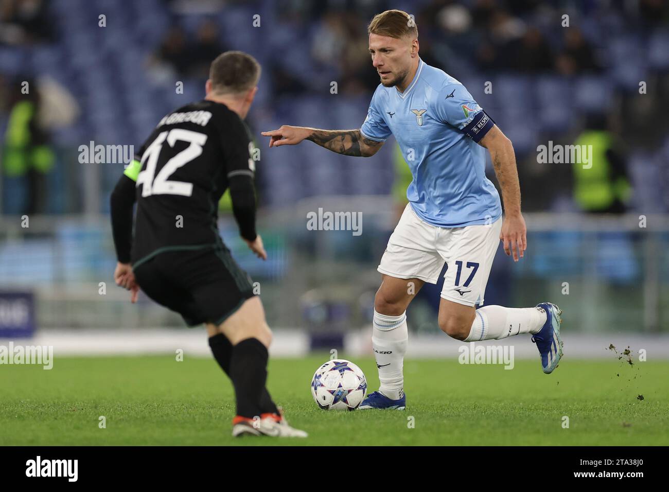 Lazio’s Italian forward Ciro Immobile challenges for the ball with ...