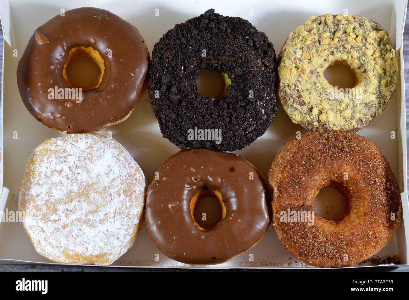 Assorted with various toppings, flavors and fillings, a doughnut or