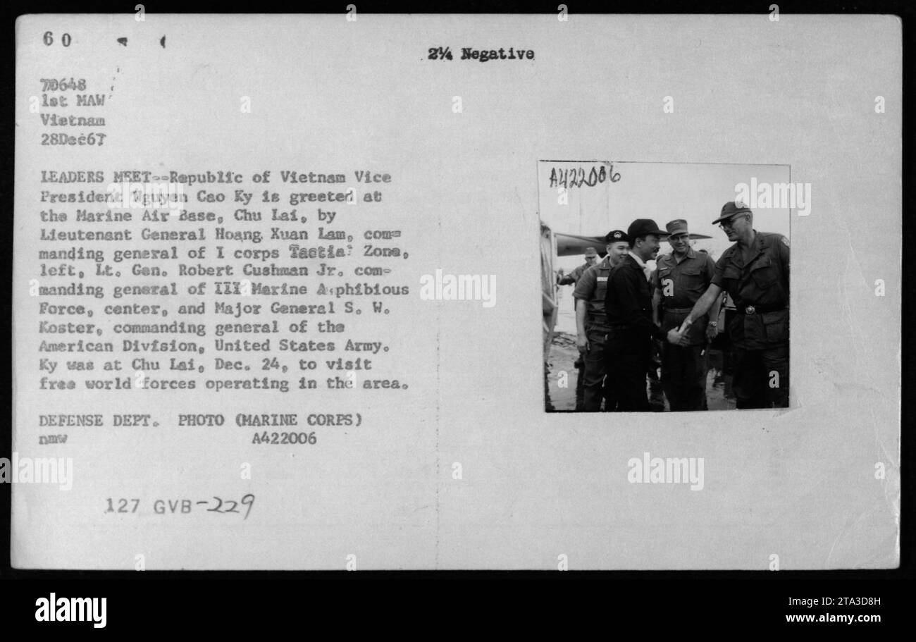 Republic of Vietnam Vice President Nguyen Cao Ky is greeted at Marine Air Base, Chu Lai, by Lieutenant General Hoang, Xuan Lam, the commanding general of I Corps Tactical Zone. Also present were Lt. Gen. Robert Cushman Jr., commanding general of III Marine Amphibious Force, and Major General S. W. Koster, commanding general of the American Division, United States Army on December 28, 1967. Ky visited the area to meet free world forces operating there. Defense Dept. Photo (Marine Corps) A422006. Stock Photo