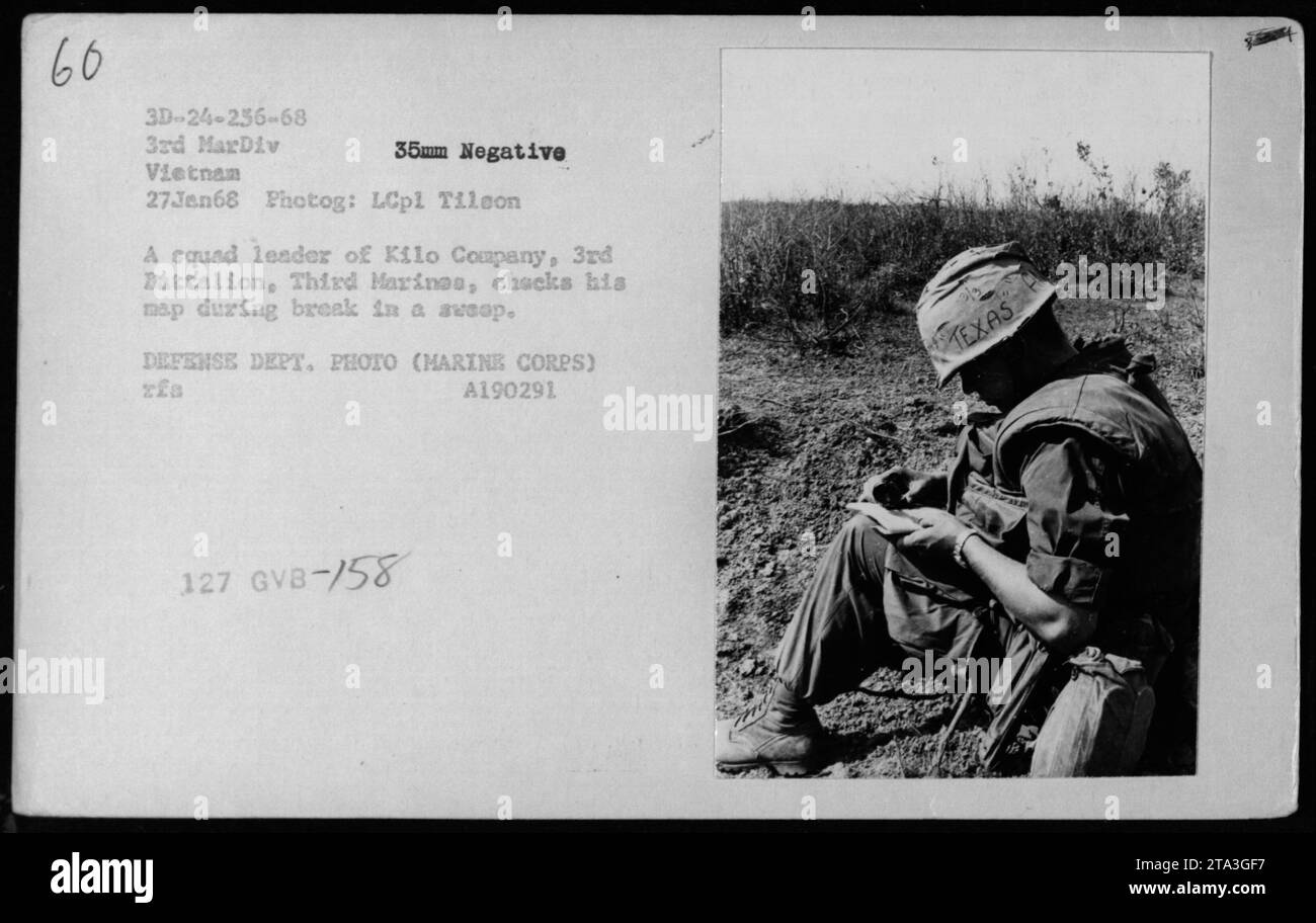 A squad leader of Kilo Company, 3rd Battalion, Third Marines, takes a nap during a break in a sweep on January 27, 1968 in Vietnam. This photograph was taken by LCpl Tileon and is part of the Defense Department photo collection. Image number: A190291 127 GVB-158 TEXAS. Stock Photo