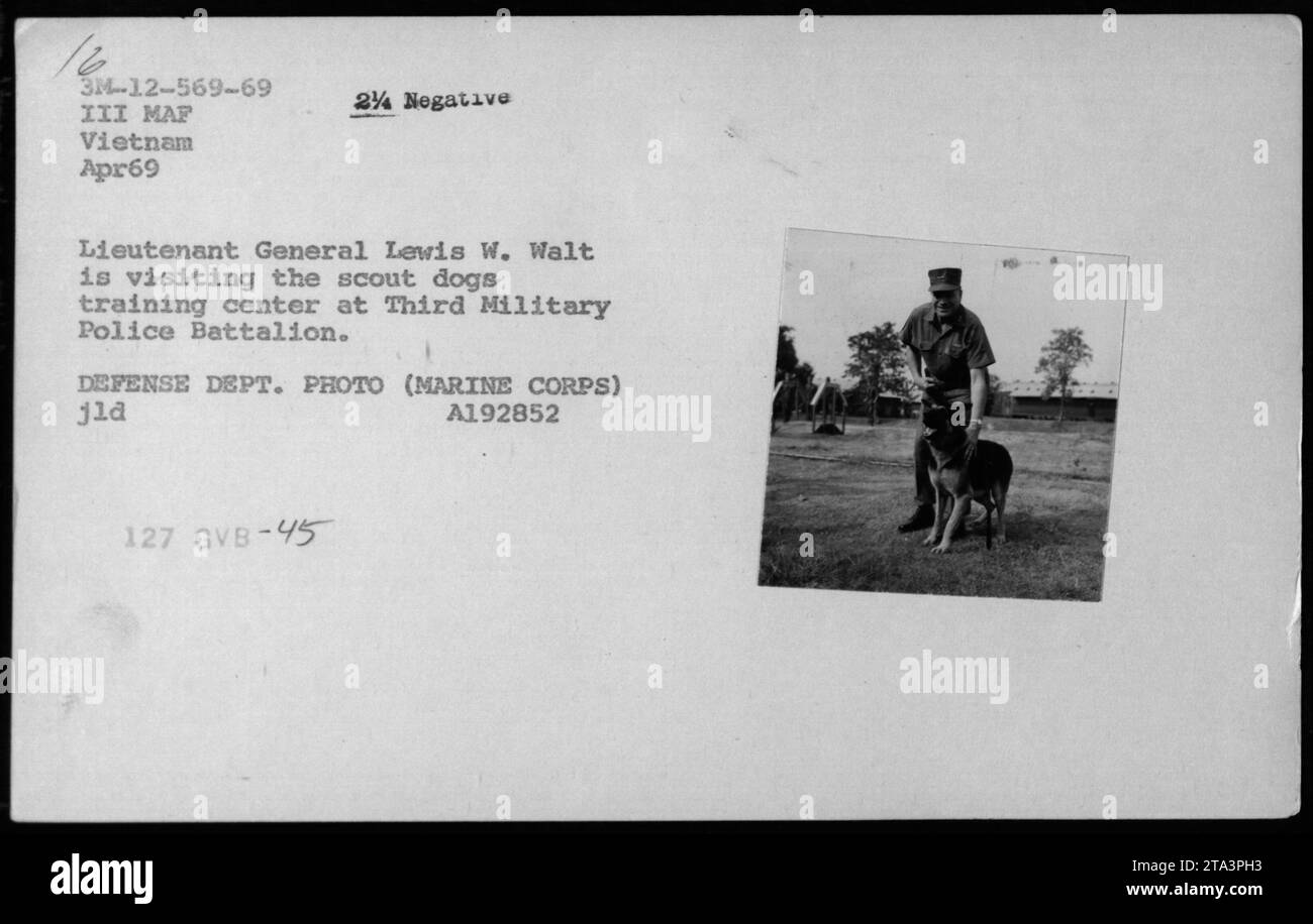 Lieutenant General Lewis W. Walt visits the scout dogs training center