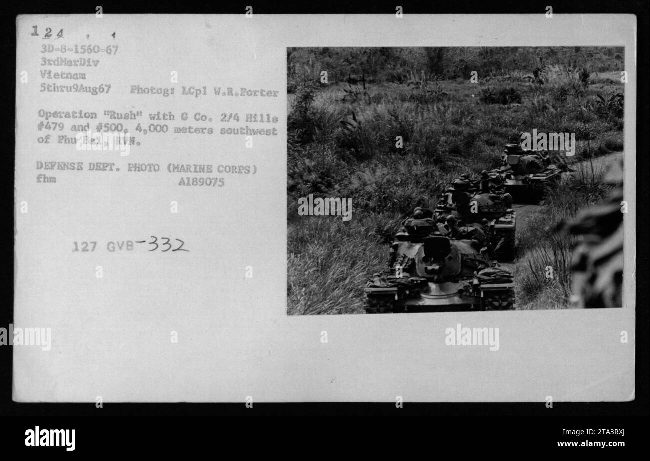 A group of American tanks during Operation 'Rush' with G Co. 2/4 in Vietnam on August 5, 1967. This image was taken by LCpl W.R. Porter, a photographer with the 3rd Marine Division. The tanks were on Hills #479 and #500, located around 4,000 meters southwest of Phu Bai, RVN. This photograph is credited to the Defense Department and belongs to the Marine Corps archives, with the ID number A189075. Stock Photo