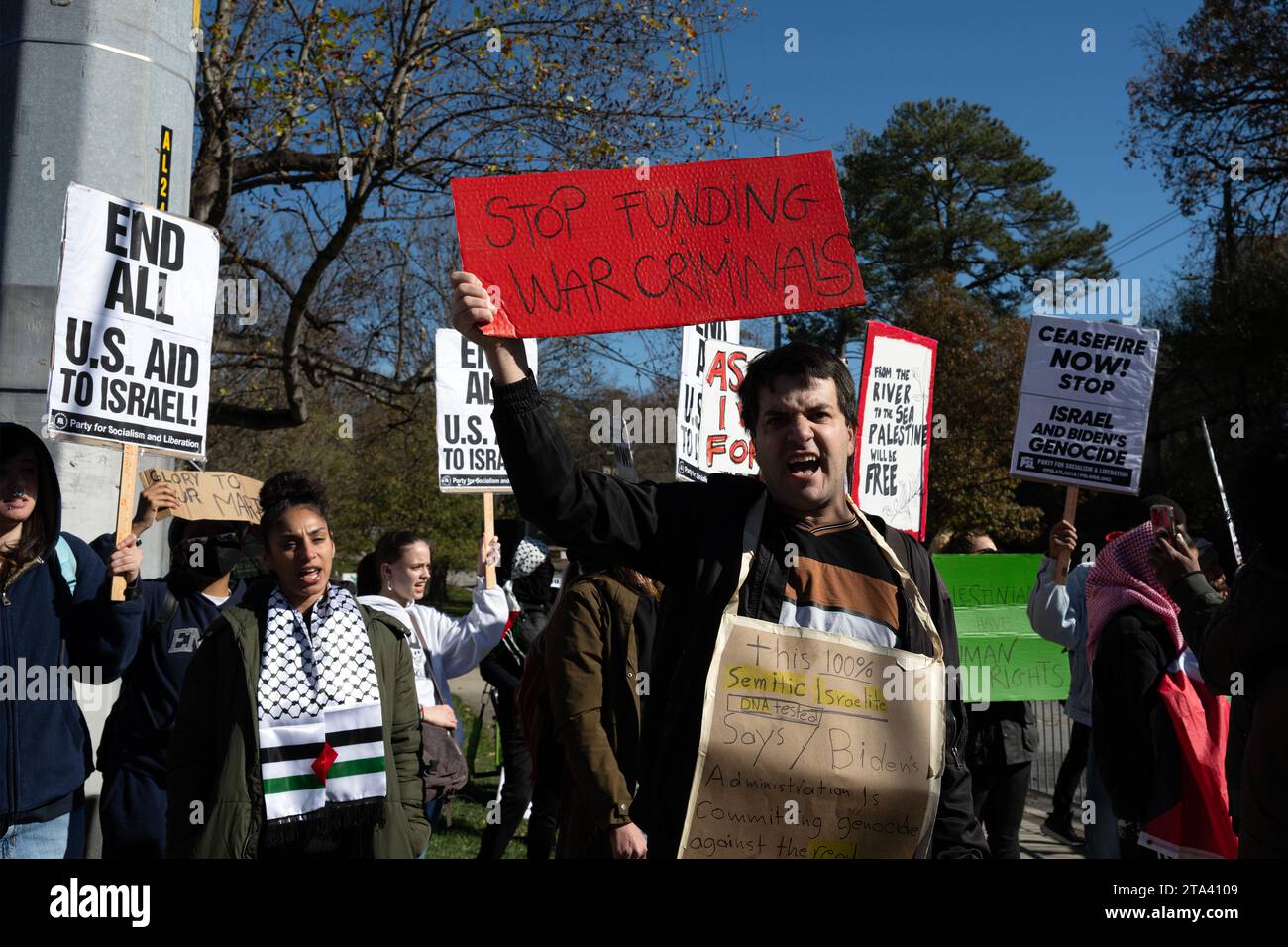 Atlanta, Georgia, USA. 28th Nov, 2023. Pro-Palestinian protesters are kept a safe distance away from Glenn Memorial church where memorial service was held for former First Lady Rosalyn Carter. The group hoped to make their anger about U.S. support for Israel known to President Biden as his motorcade passed en route to the service. (Credit Image: © Robin Rayne/ZUMA Press Wire) EDITORIAL USAGE ONLY! Not for Commercial USAGE! Stock Photo