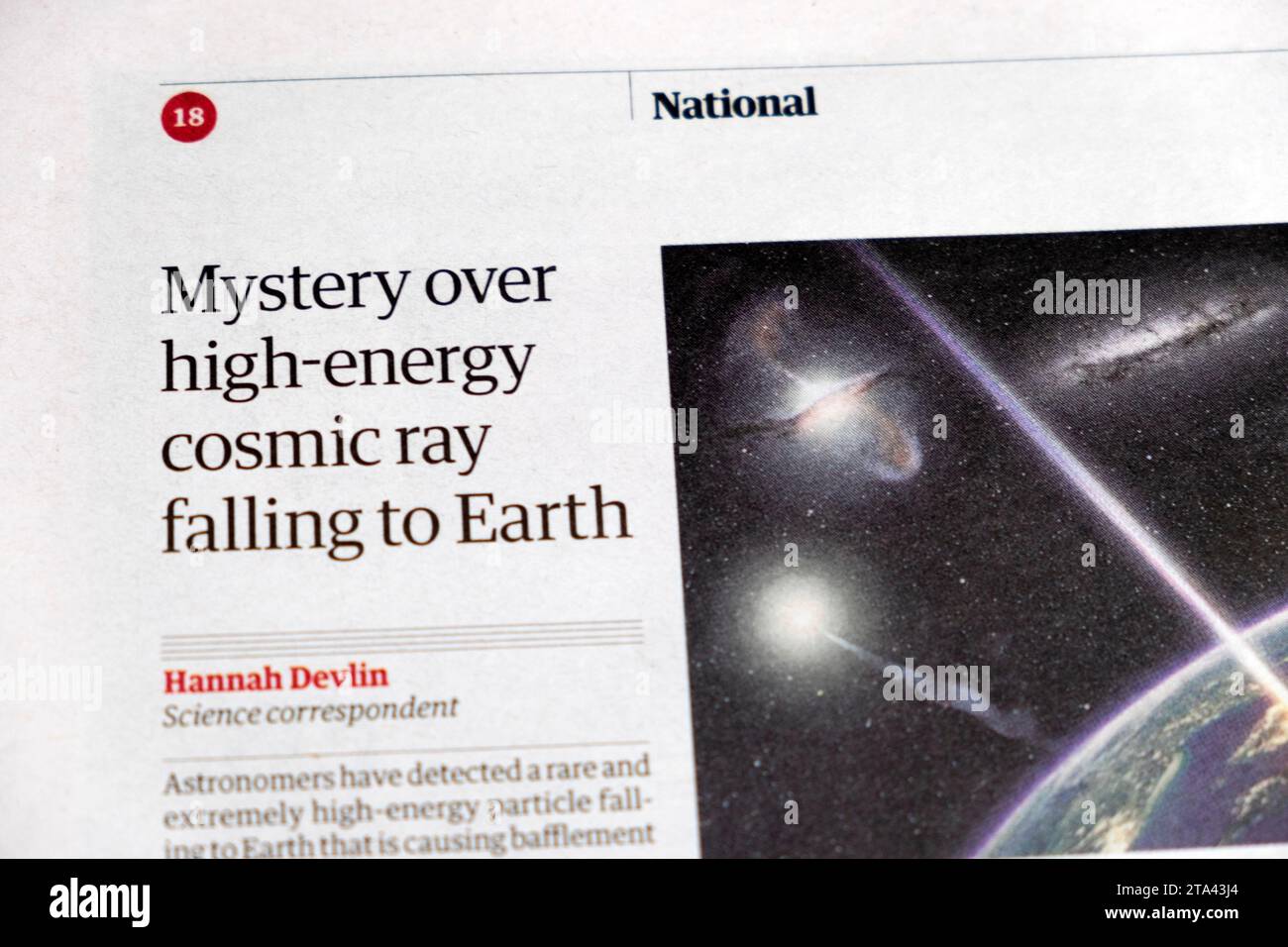 'Scientific Mystery over high-energy cosmic ray falling to Earth' Guardian newspaper headline Amaterasu space science article November 2023 London UK Stock Photo