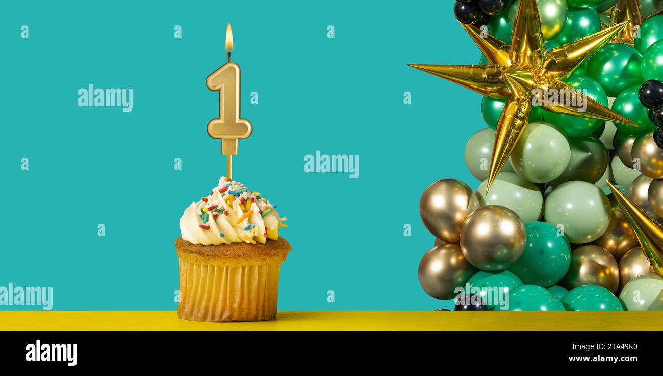 Birthday card number 1 - Cupcake with balloons Stock Photo
