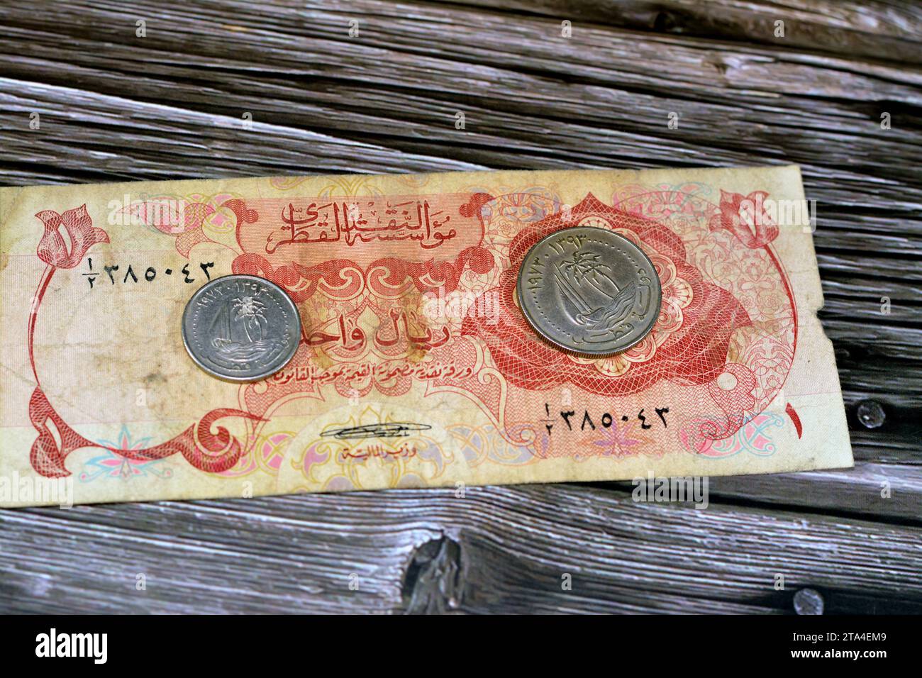 Qatari Money, money background of old coins and banknotes of riyals of