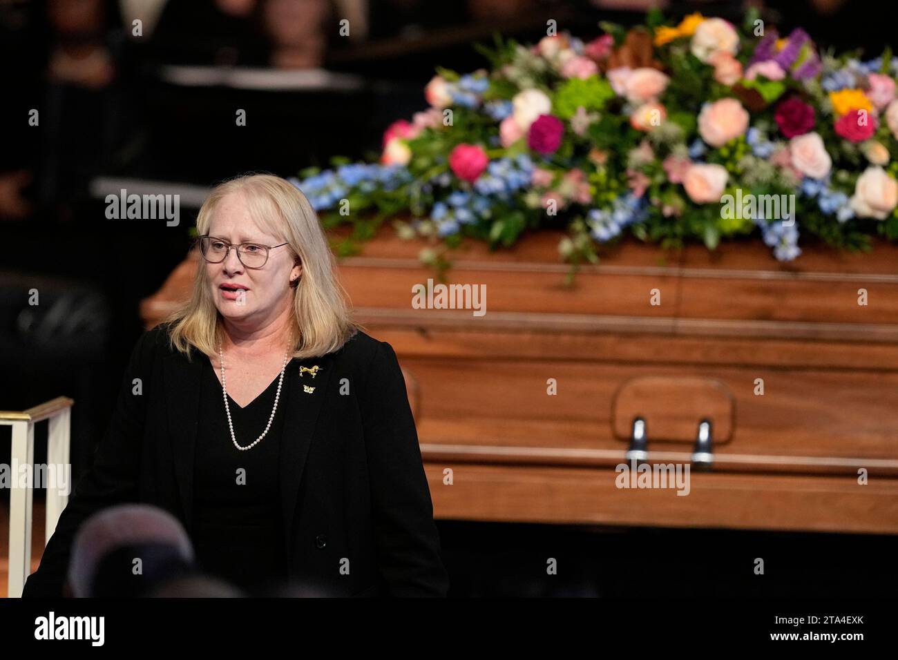 Atlanta, United States. 28th Nov, 2023. Amy Carter walks past the casket after speaking at a tribute service for her mother, former first lady Rosalynn Carter, at Glenn Memorial Church at Emory University on Tuesday, November 28, 2023, in Atlanta, Georgia. Pool Photo by Brynn Anderson/UPI Credit: UPI/Alamy Live News Stock Photo
