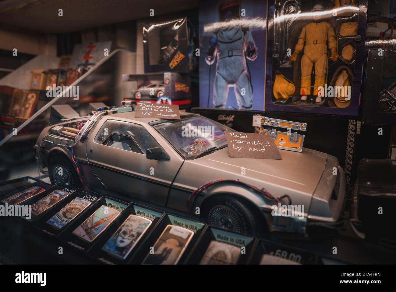 Back to the Future Delorean Car and Memorabilia Display in Nostalgic Exhibition Setting Stock Photo