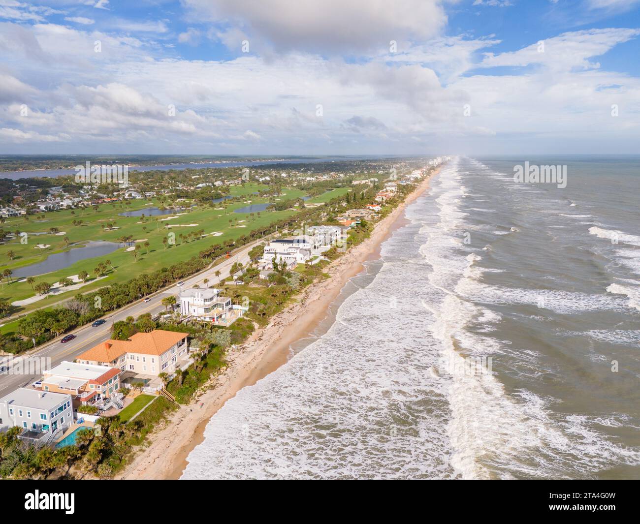 Aerial stock photo luxury homes on Ormond and Triton Beach Florida USA