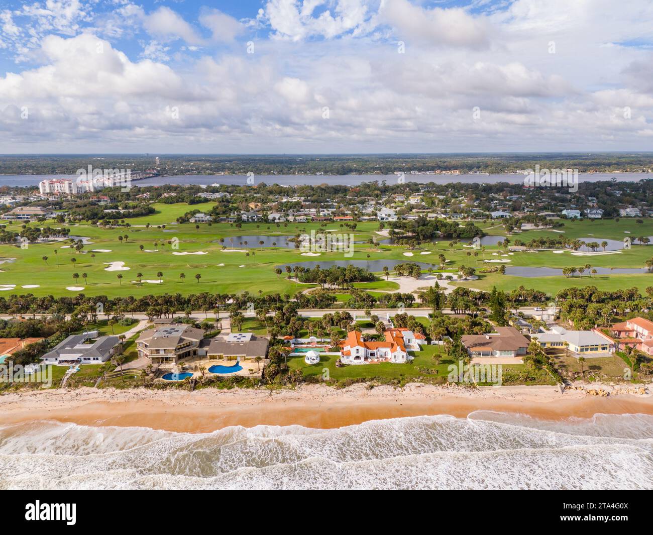 Aerial stock photo luxury homes on Ormond and Triton Beach Florida USA