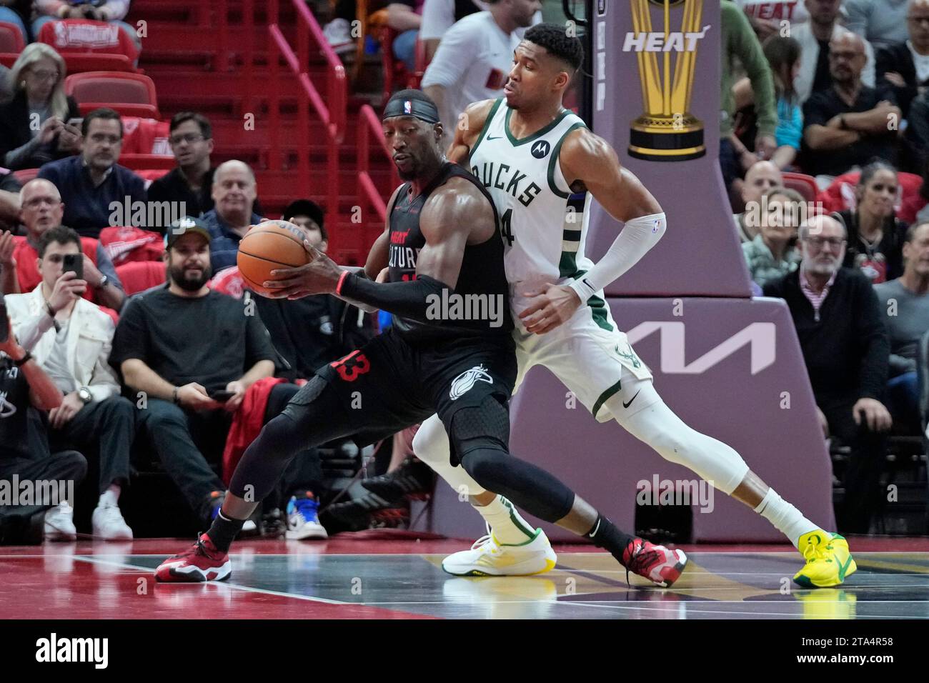 Miami Heat center Bam Adebayo (13) drives to the basket against