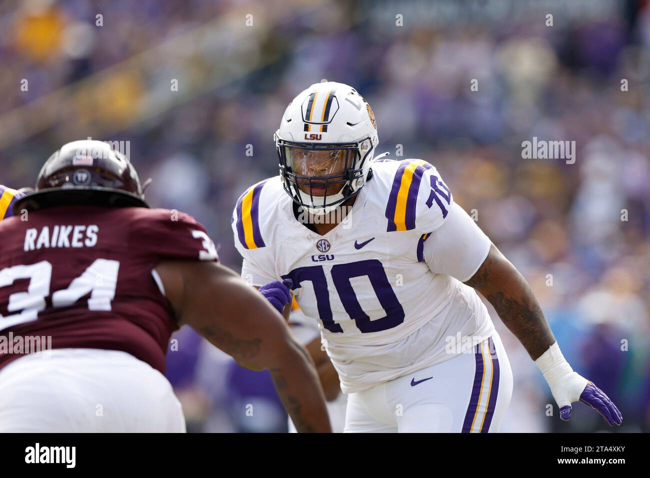 Lsu Offensive Lineman Miles Frazier (70) Looks To Block During An Ncaa 