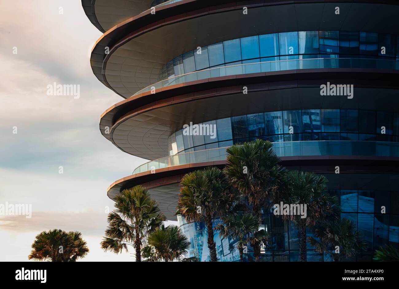 a Modern architecture facing the seaside view. in the morning and the sun lights the facade. Stock Photo