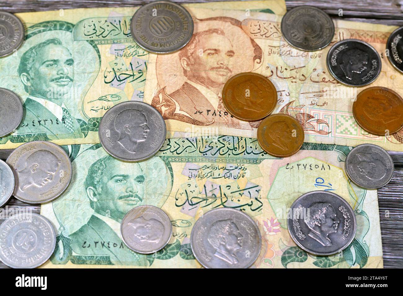 Jordanian money background of old coins and banknotes of Dinars of old
