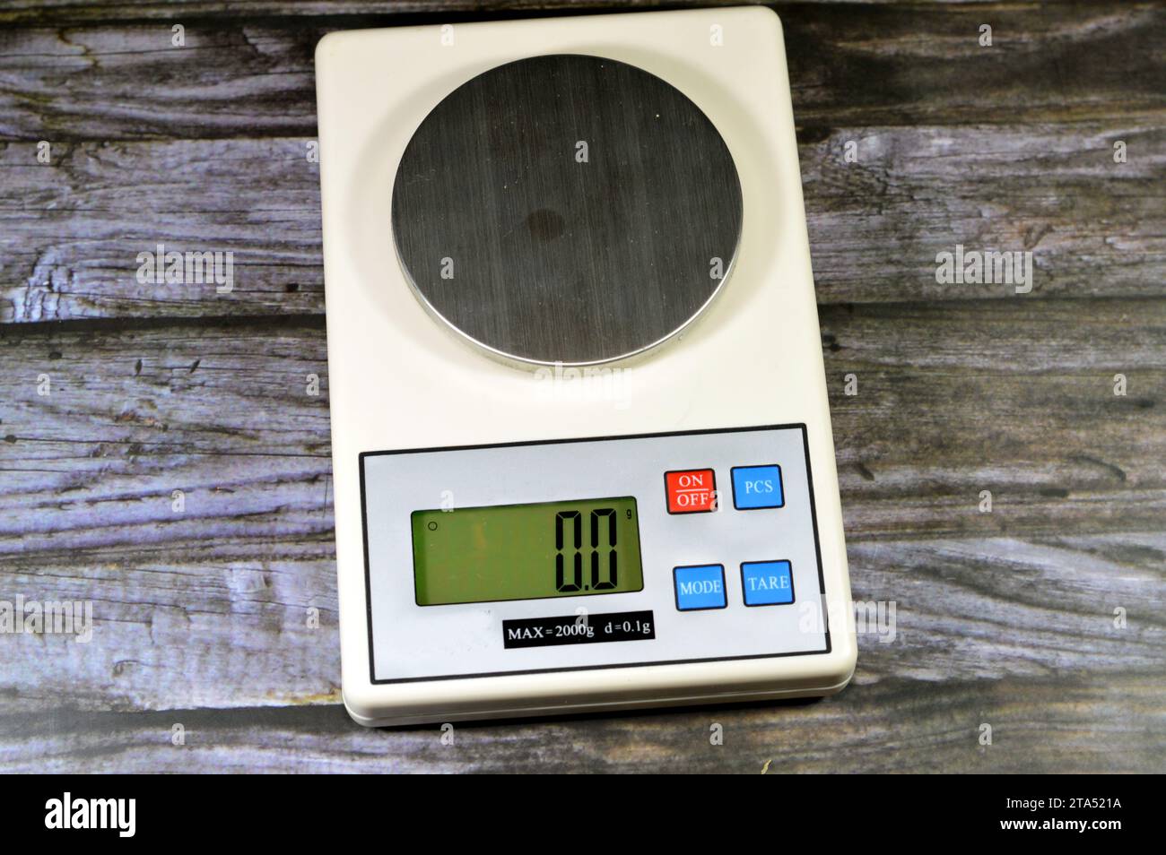 A digital scale in grams, electronic digital scale for home, school