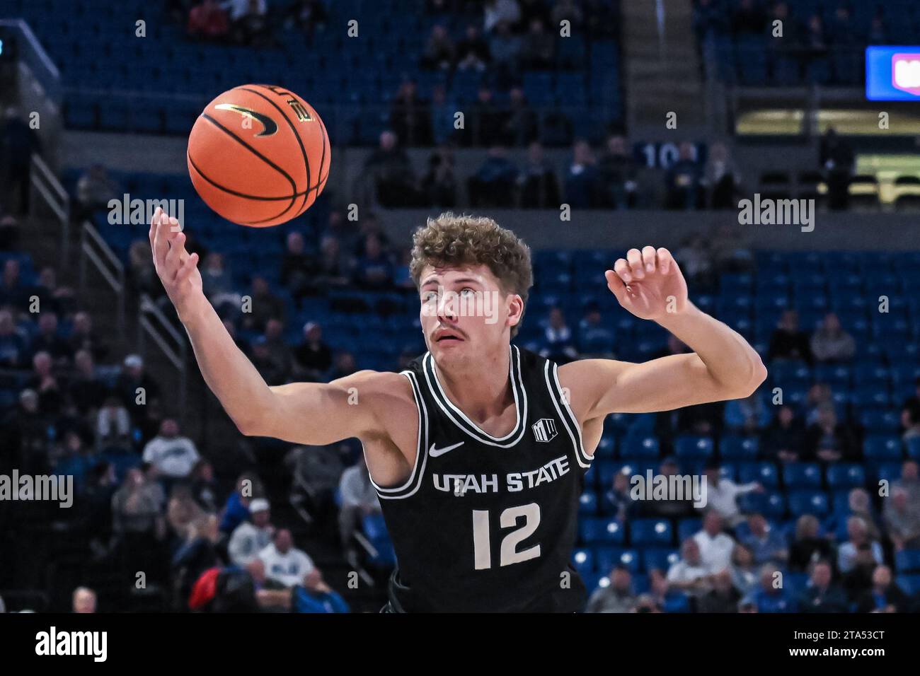 NOVEMBER 28, 2023: Utah State Aggies guard Mason Falslev (12) grabs the loose ball in the air in a regular season game where the Utah State Aggies visited the St. Louis Billikens. Held at Chaifetz Arena in St. Louis, MO on Wednesday November 28, 2023 Richard Ulreich/CSM Stock Photo