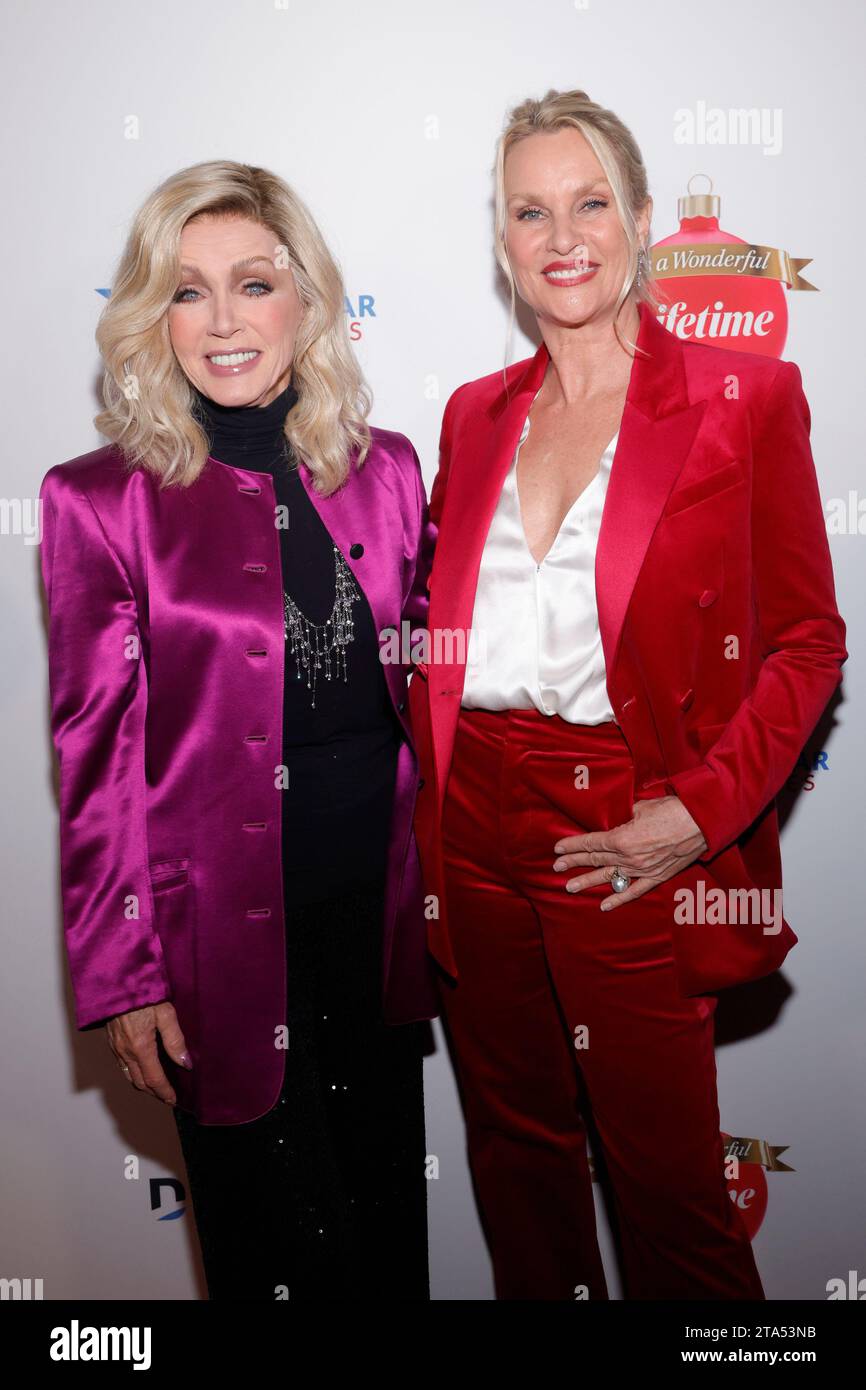 BEVERLY HILLS, CA 0 NOVEMBER 28: Donna Mills and Nicollette Sheridan at Gift Of A Lifetime Red Carpet Event at The Melbourne in Beverly Hills, California on November 28, 2023. Credit: Faye Sadou/MediaPunch Credit: MediaPunch Inc/Alamy Live News Stock Photo
