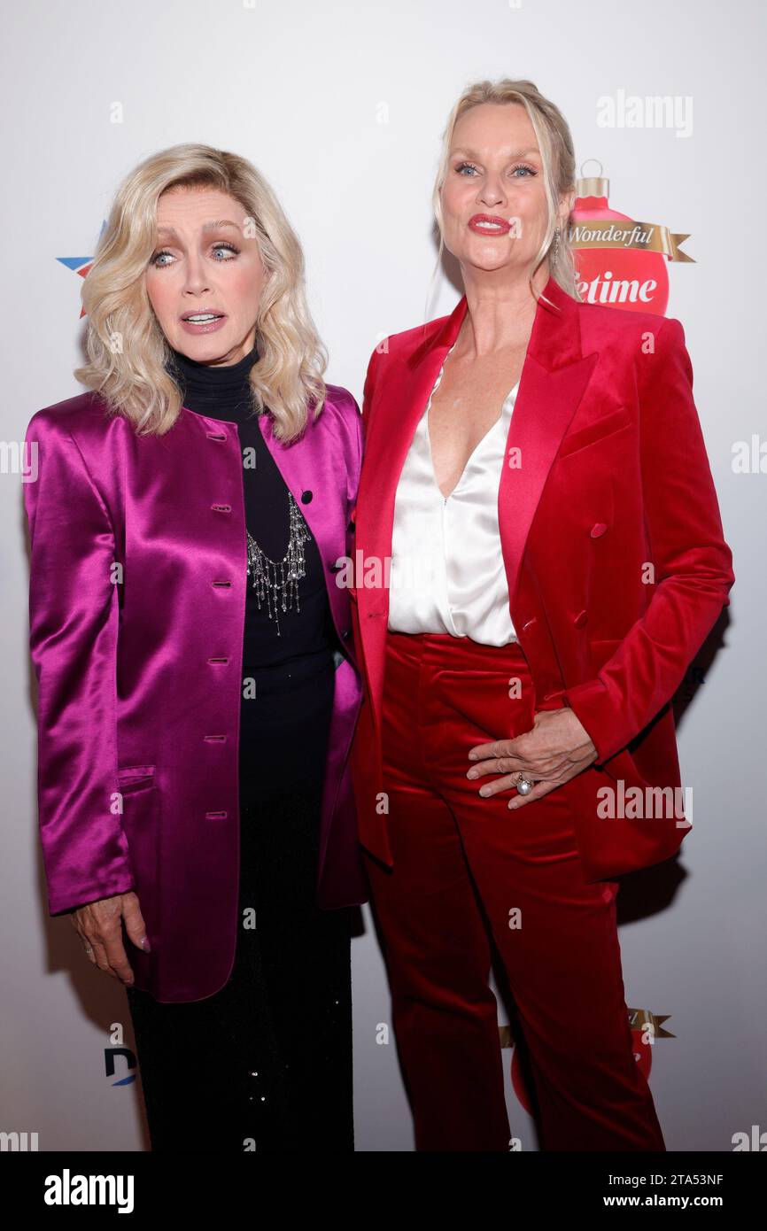 BEVERLY HILLS, CA 0 NOVEMBER 28: Donna Mills and Nicollette Sheridan at Gift Of A Lifetime Red Carpet Event at The Melbourne in Beverly Hills, California on November 28, 2023. Credit: Faye Sadou/MediaPunch Credit: MediaPunch Inc/Alamy Live News Stock Photo