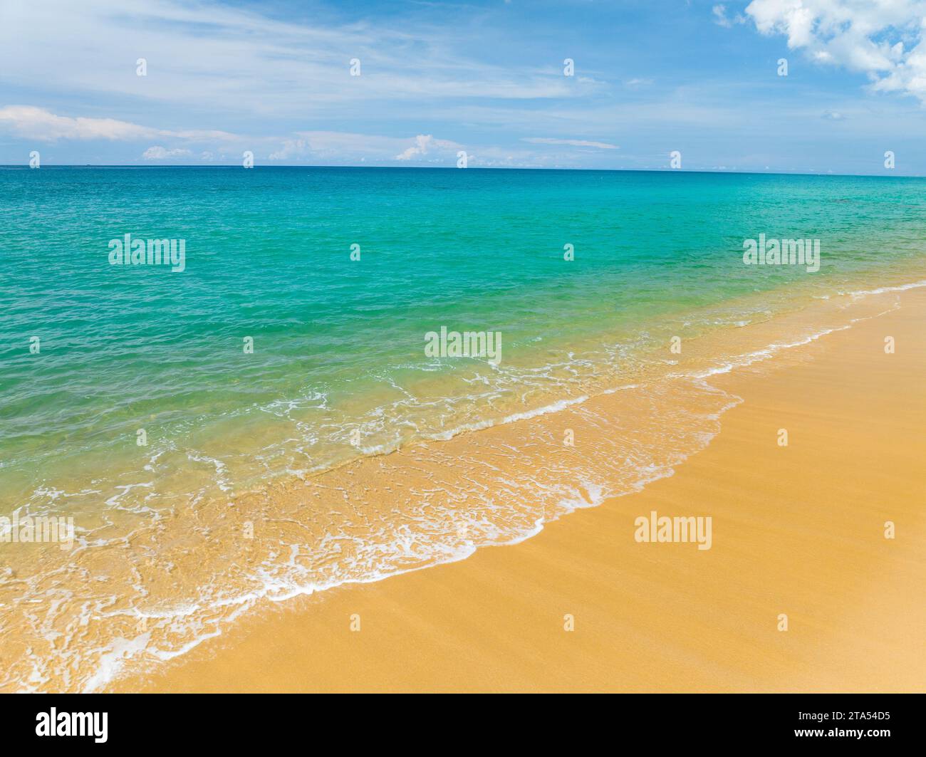 Aerial view of sea crashing waves White foaming waves on beach sand ...