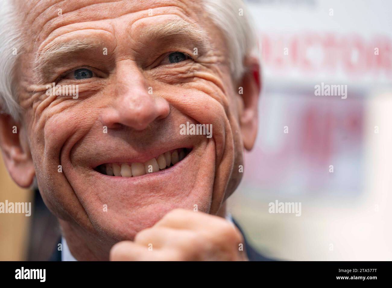 Washington, United States. 07th Sep, 2023. Peter Navarro, an advisor to former president Donald Trump, smiles as members of his legal team speak to press surrounded by demonstrators after he was found guilty of contempt of Congress at the E. Barrett Prettyman United States Court House in Washington, DC, on Thursday, September 7, 2023. Navarro was found guilty for failing to comply with a congressional subpoena connected with January 6, 2021. Photo by Bonnie Cash/UPI Credit: UPI/Alamy Live News Stock Photo